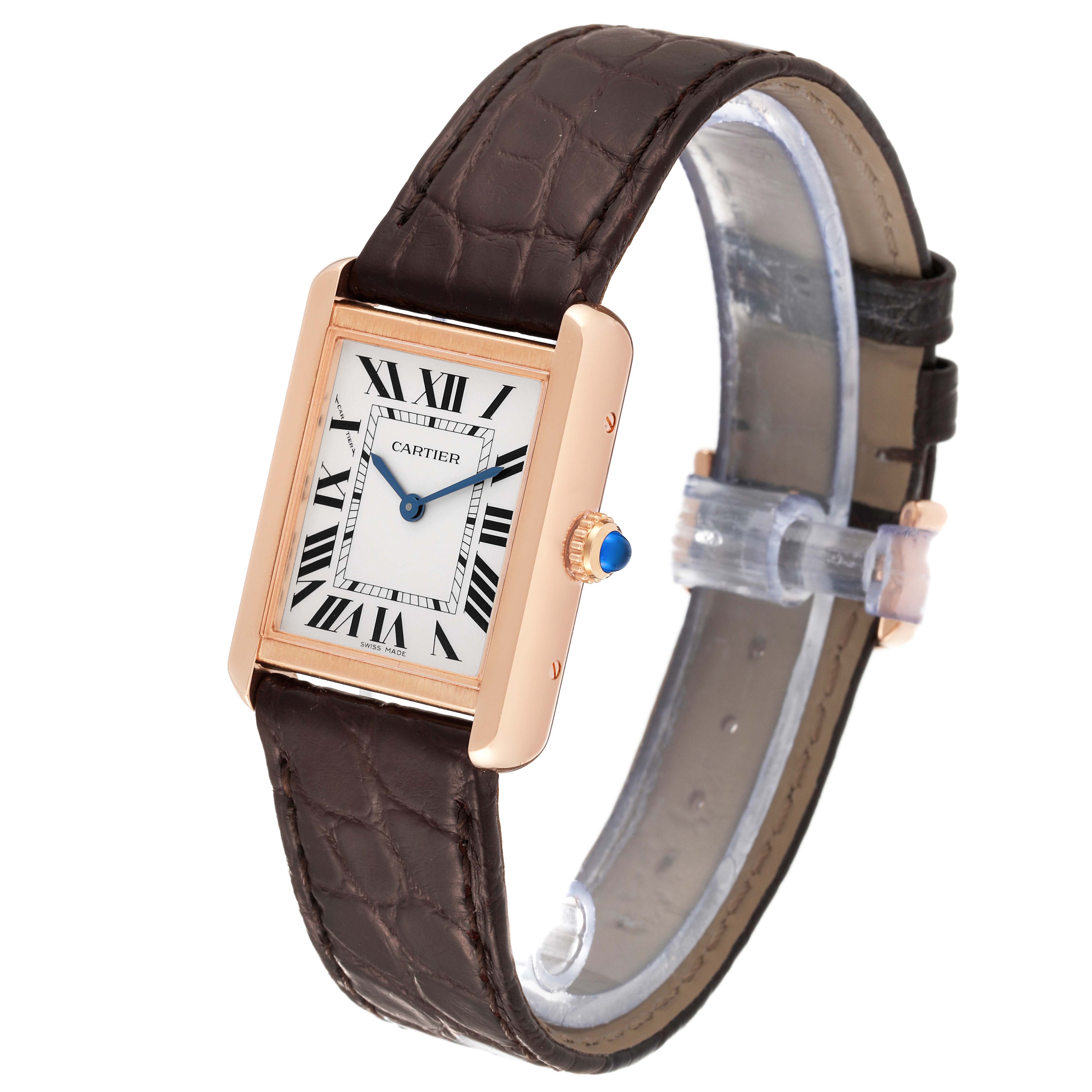 The Cartier Tank Solo W5200024 Women
s Steel and Gold (two tone) Silver Dial W5200024 Women
s Steel and Gold (two tone) Silver Dial watch is shown at a three-quarter angle, displaying its face, crown, and leather strap.