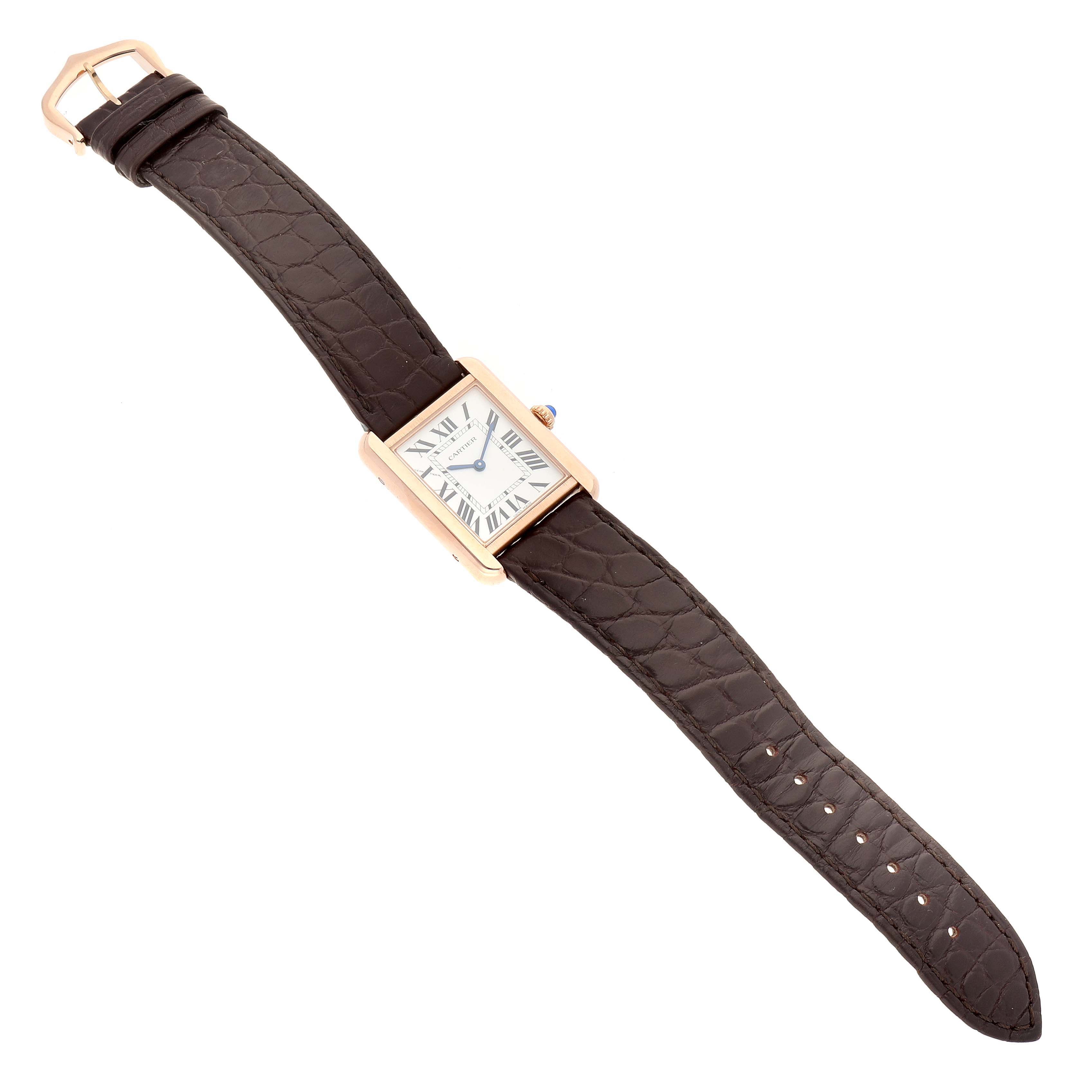 The Cartier Tank Solo W5200024 Women
s Steel and Gold (two tone) Silver Dial W5200024 Women
s Steel and Gold (two tone) Silver Dial watch is shown from an overhead angle, displaying the face, bezel, and full leather strap.