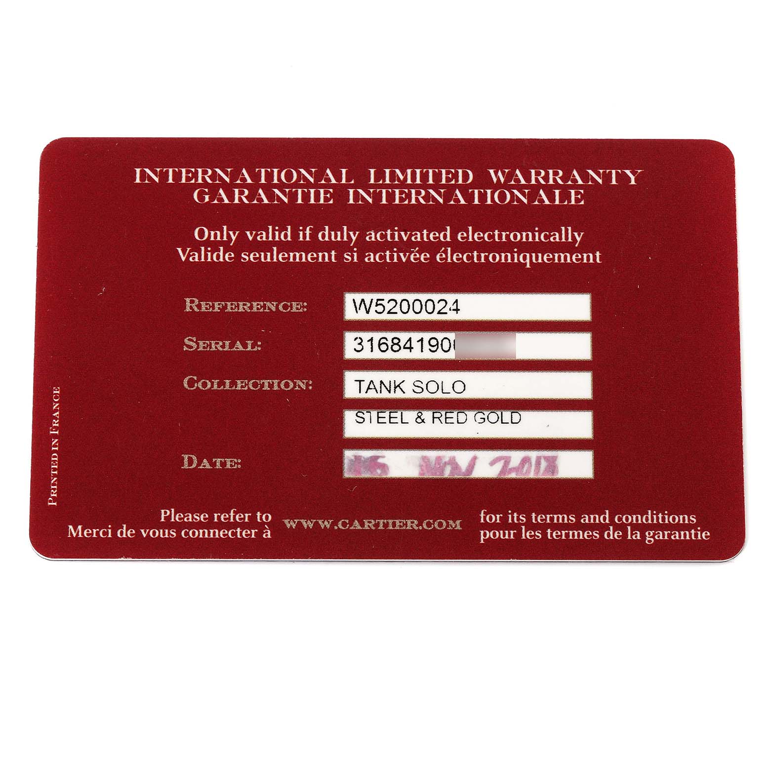 The image shows an international limited warranty card for the Cartier Tank Solo W5200024 Women
s Steel and Gold (two tone) Silver Dial W5200024 Women
s Steel and Gold (two tone) Silver Dial model watch, revealing its reference, serial number, collection, and purchase date.