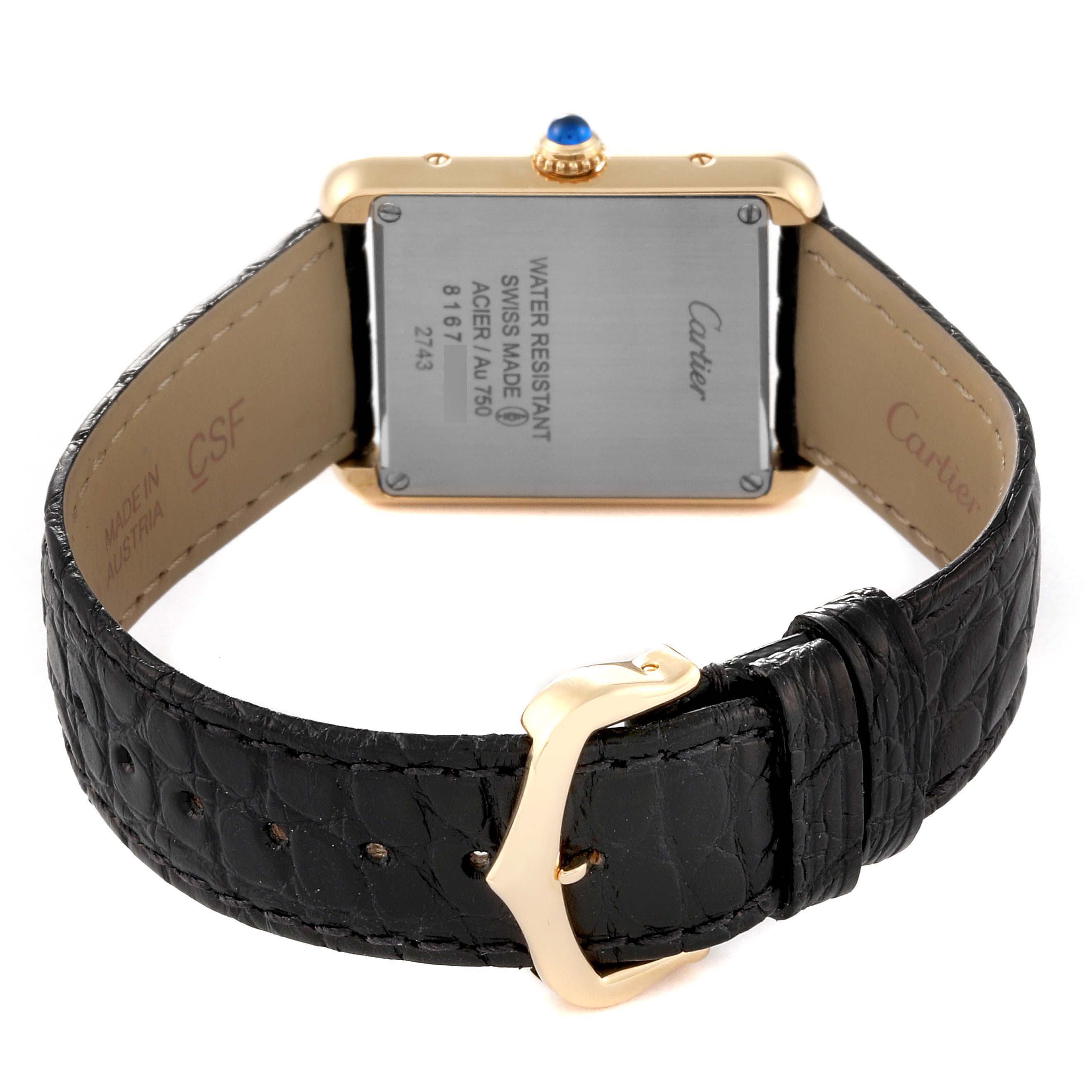 This image shows the back case, leather strap, and buckle of the Cartier Tank Solo W1018755 Women
s Steel and Gold (two tone) Silver Dial W1018755 Women
s Steel and Gold (two tone) Silver Dial watch.