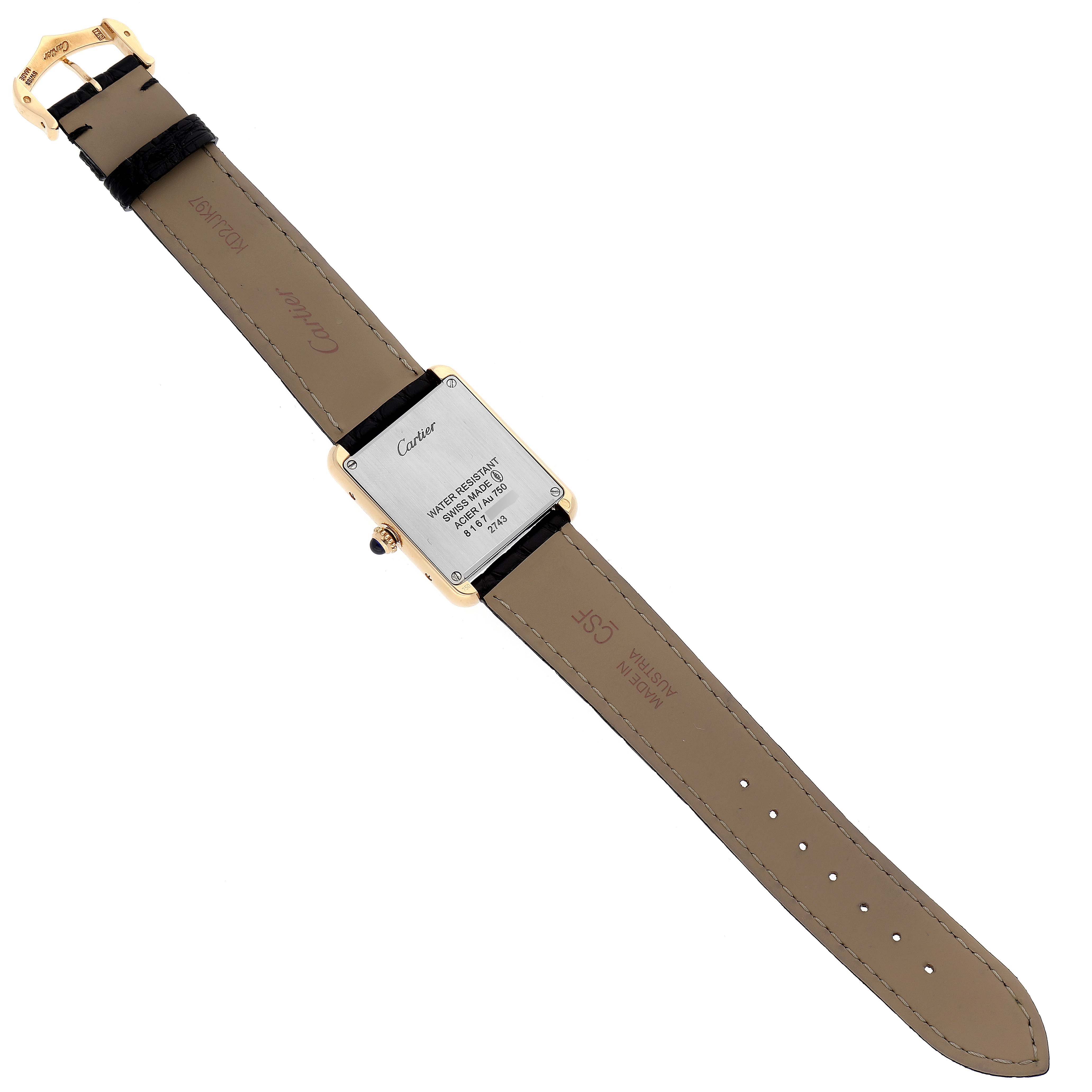 The image shows the back view of a Cartier Tank Solo W1018755 Women
s Steel and Gold (two tone) Silver Dial W1018755 Women
s Steel and Gold (two tone) Silver Dial watch, displaying the case back and leather strap.