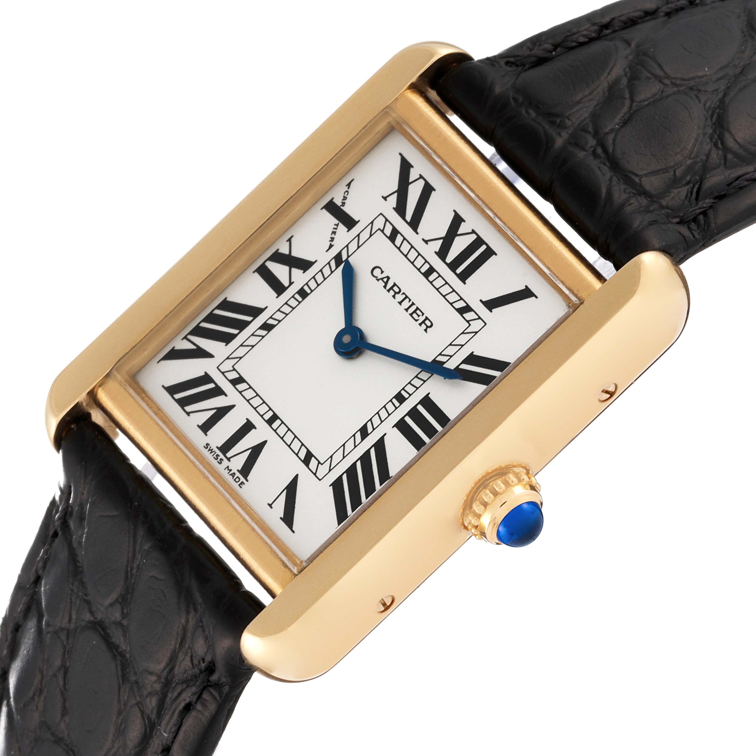 This image shows a Cartier Tank Solo W1018755 Women
s Steel and Gold (two tone) Silver Dial W1018755 Women
s Steel and Gold (two tone) Silver Dial watch at an oblique angle, highlighting the face, crown, and part of the leather strap.