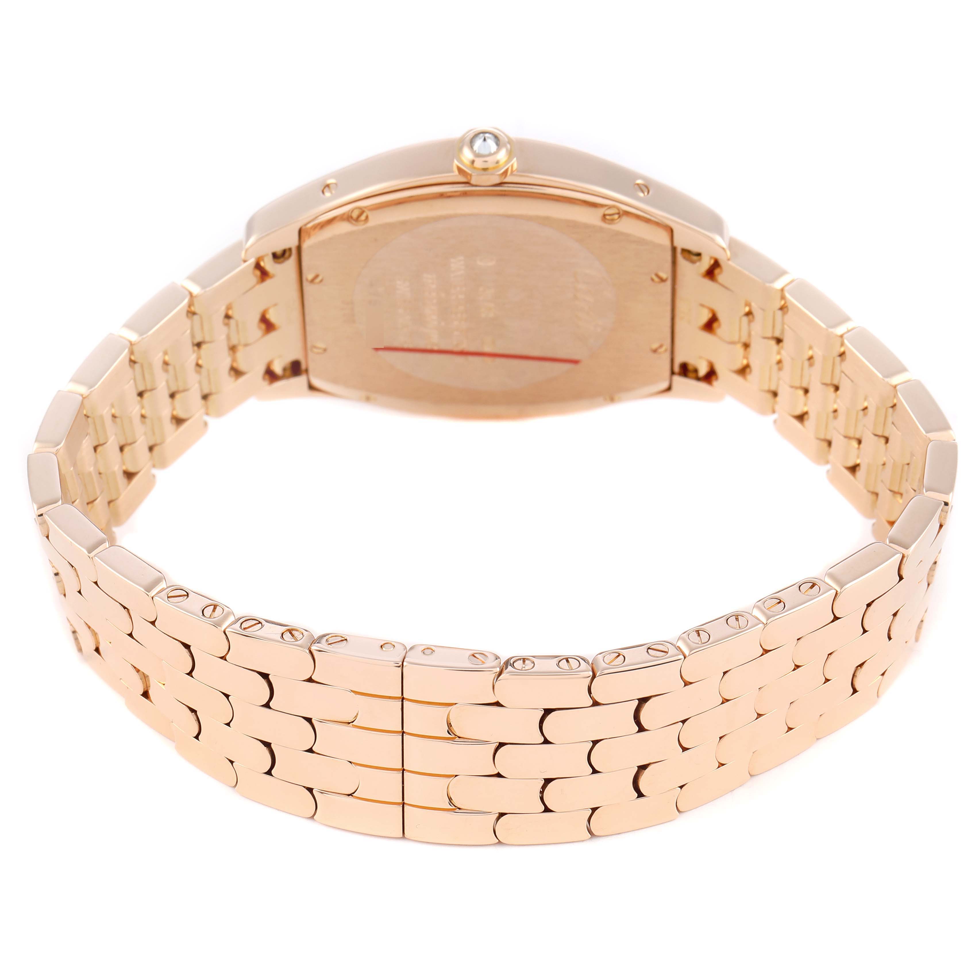 The Cartier Tortue WA501012 Women's Rose Gold Silver Dial watch is shown from a rear angle, highlighting the back case and gold bracelet.