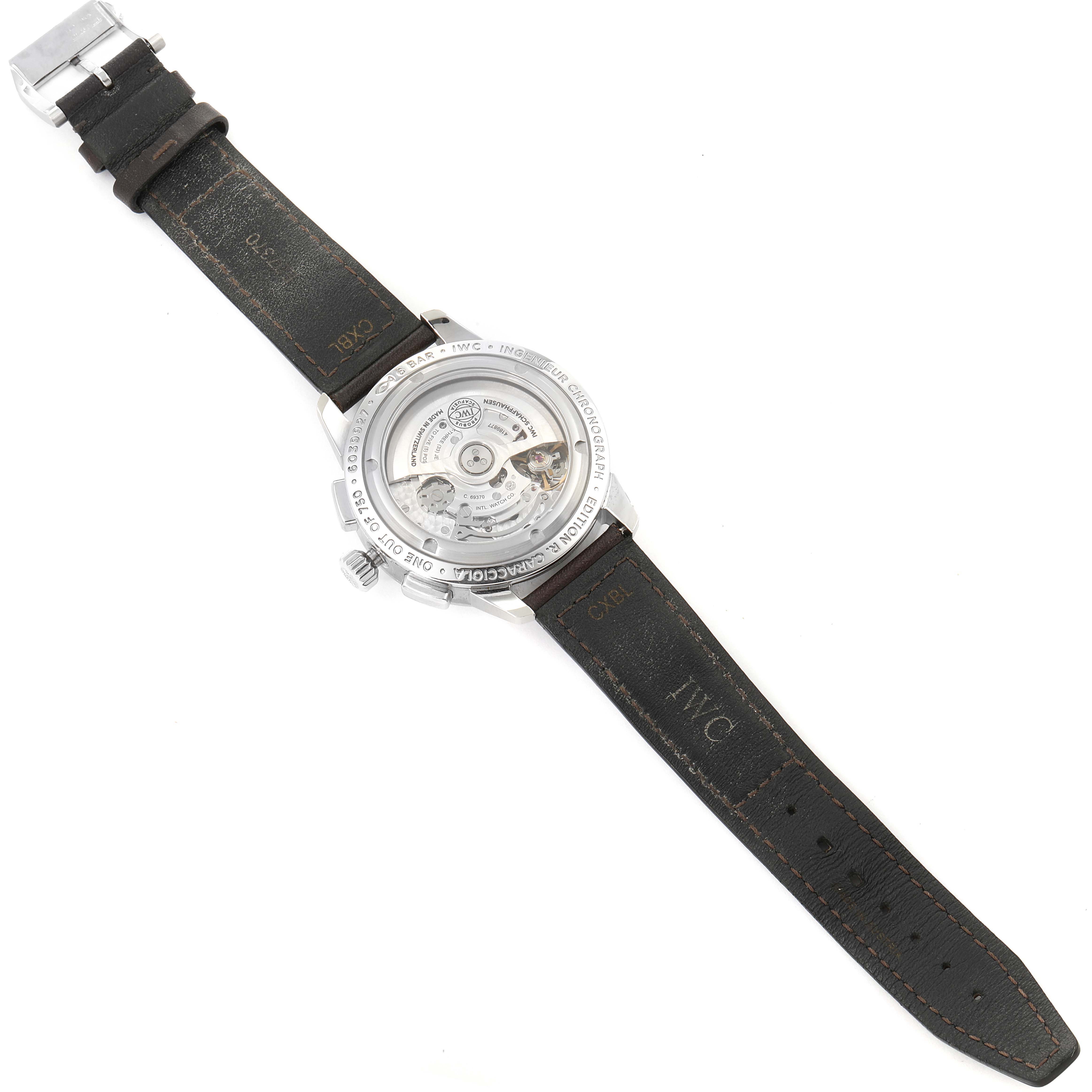 The image shows the backside of the IWC Ingenieur IW380702 Men's Stainless Steel Grey Dial IW380702 Men's Stainless Steel Grey Dial watch, displaying its transparent case back and black leather strap.