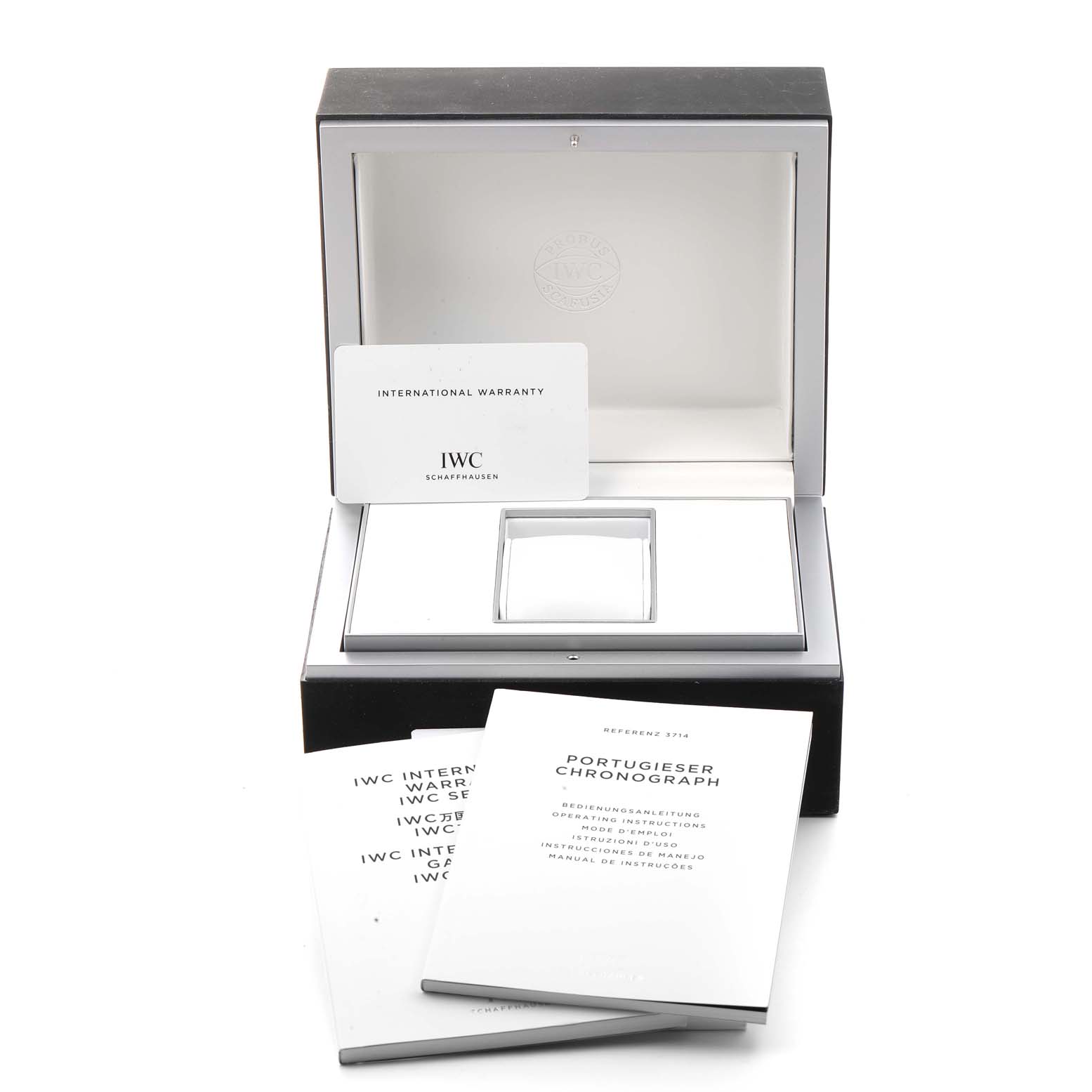 The image shows the open box, warranty card, and manuals for an IWC Portuguese IW371445 Men's Stainless Steel Silver Dial IW371445 Men's Stainless Steel Silver Dial Chronograph watch.