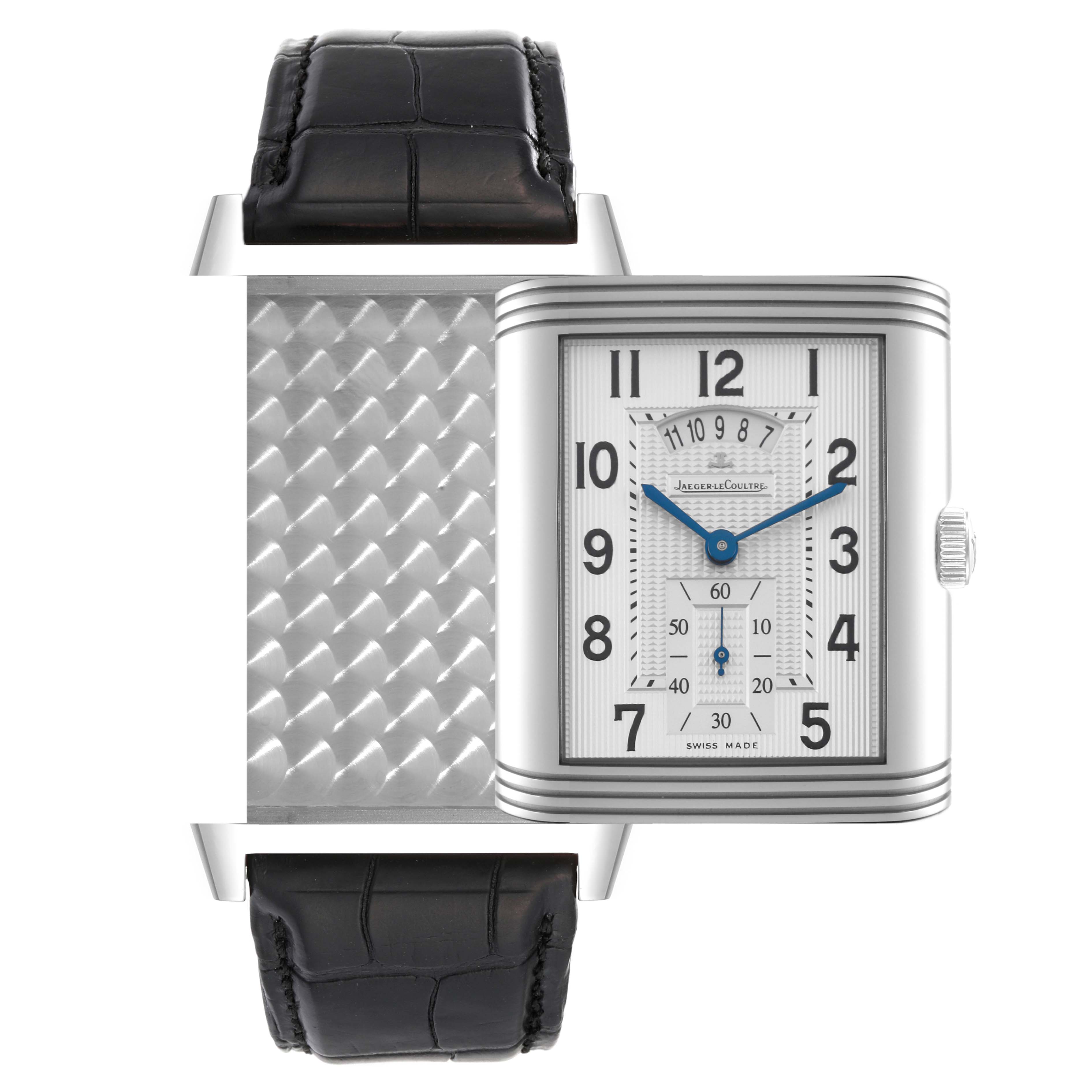 The image shows the front and inner back of a Jaeger-LeCoultre Reverso watch, alongside its black leather strap.