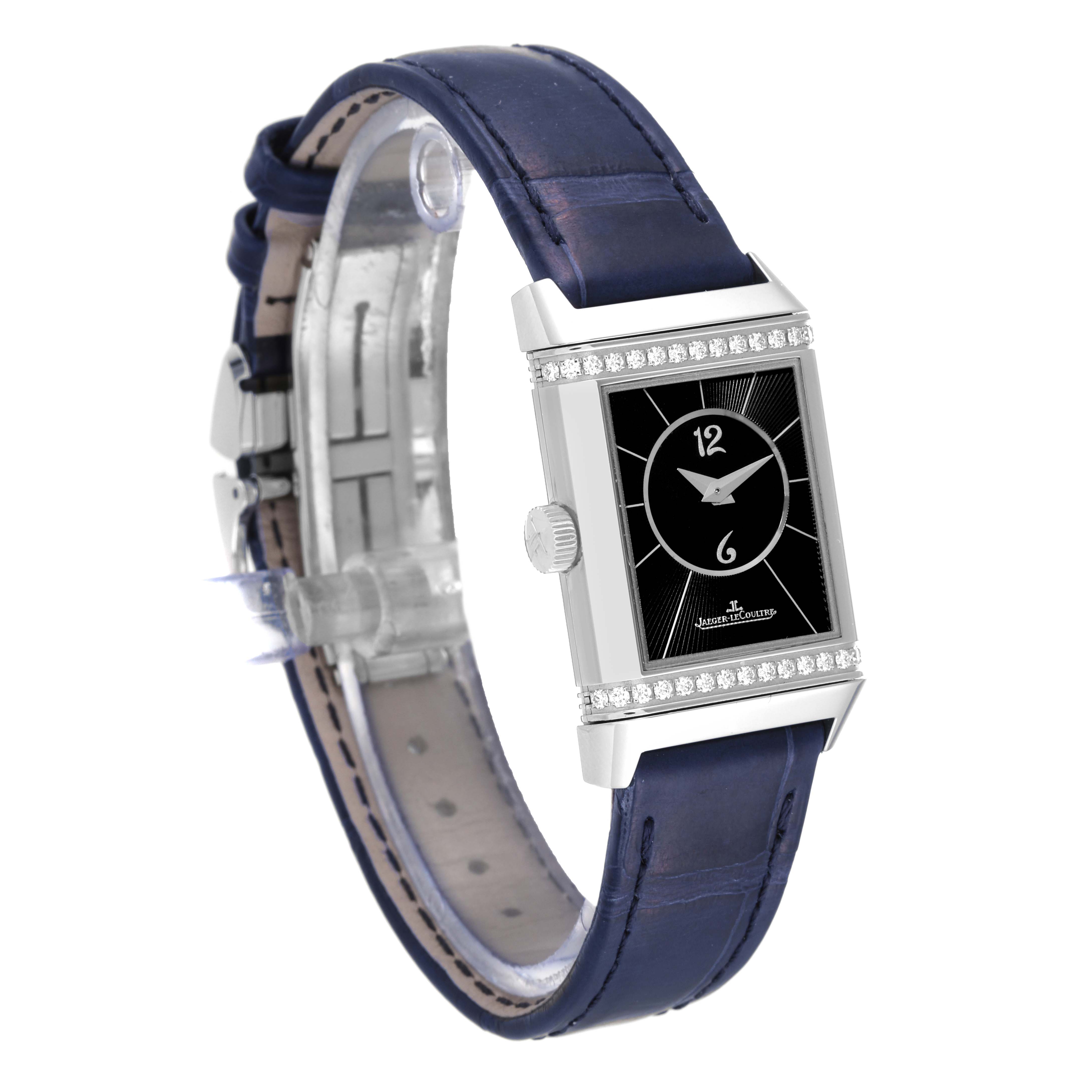 The image shows a Jaeger LeCoultre Reverso Q2668432 Women's Stainless Steel Silver Dial Q2668432 Women's Stainless Steel Silver Dial watch from a front angle, highlighting its black dial, rectangular face, and blue strap.
