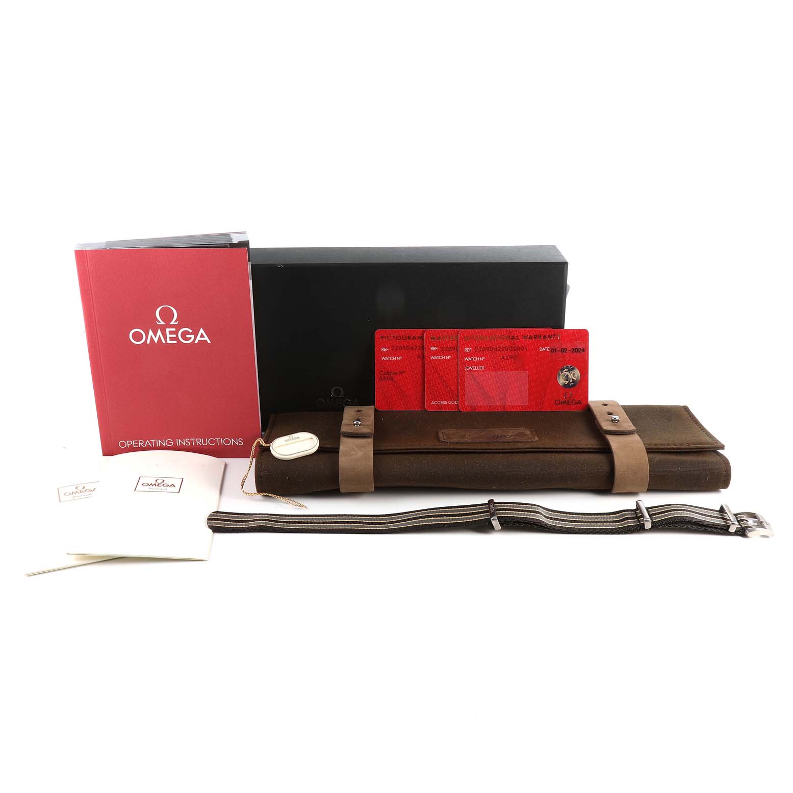 The image shows Omega Seamaster 210.90.42.20.01.001 Men's Titanium Brown Dial 210.90.42.20.01.001 Men's Titanium Brown Dial accessories, including a booklet, cards, a strap, a watch roll, and a black box.