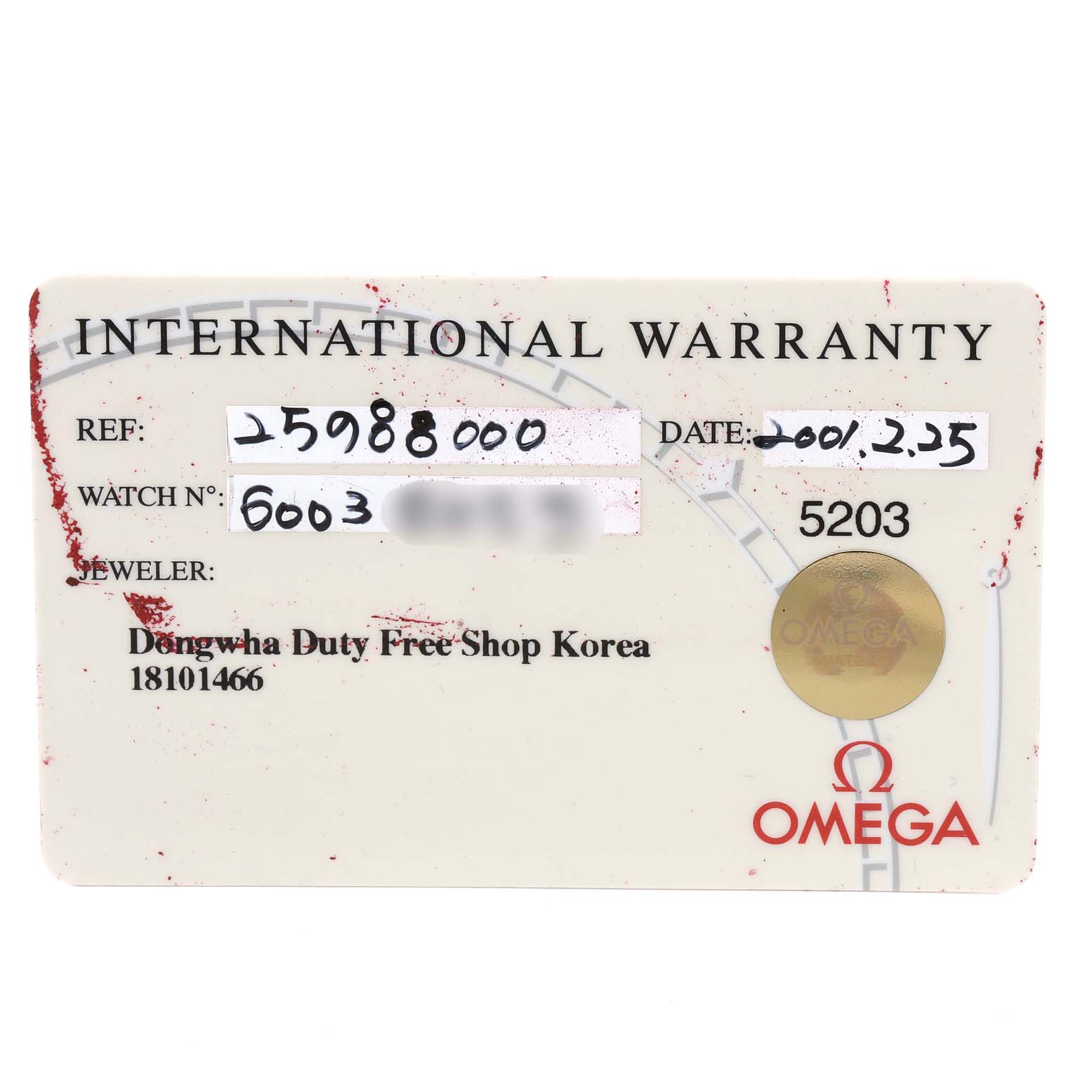 The image shows an International Warranty card for an Omega Seamaster 2598.80.00 Men
s Stainless Steel Blue Dial 2598.80.00 Men
s Stainless Steel Blue Dial watch, displaying reference, watch number, jeweler, and date.