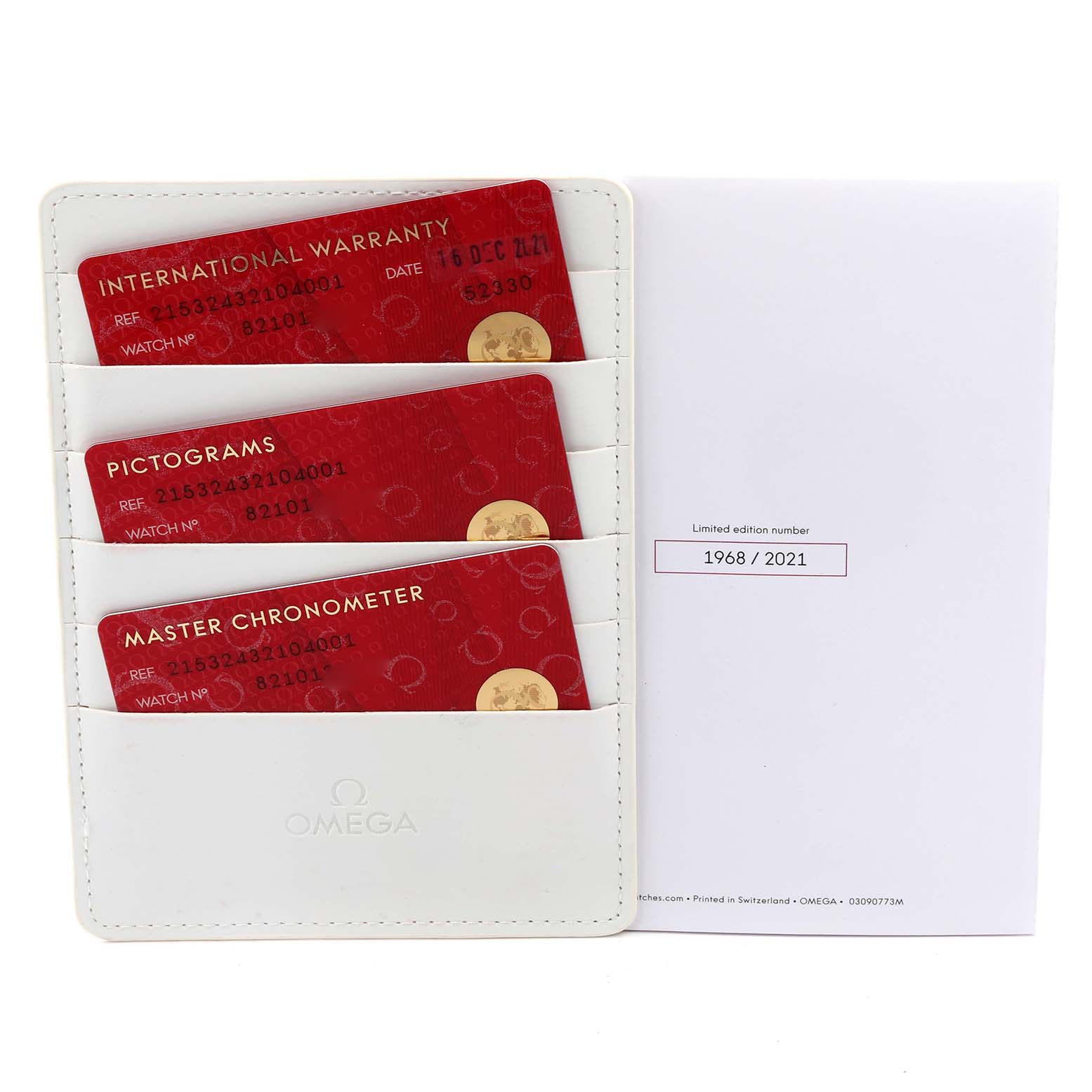 The image shows Omega Planet Ocean 215.32.43.21.04.001 Men's Stainless Steel White Dial 215.32.43.21.04.001 Men's Stainless Steel White Dial documentation, including warranty, pictogram, and chronometer cards in a holder.