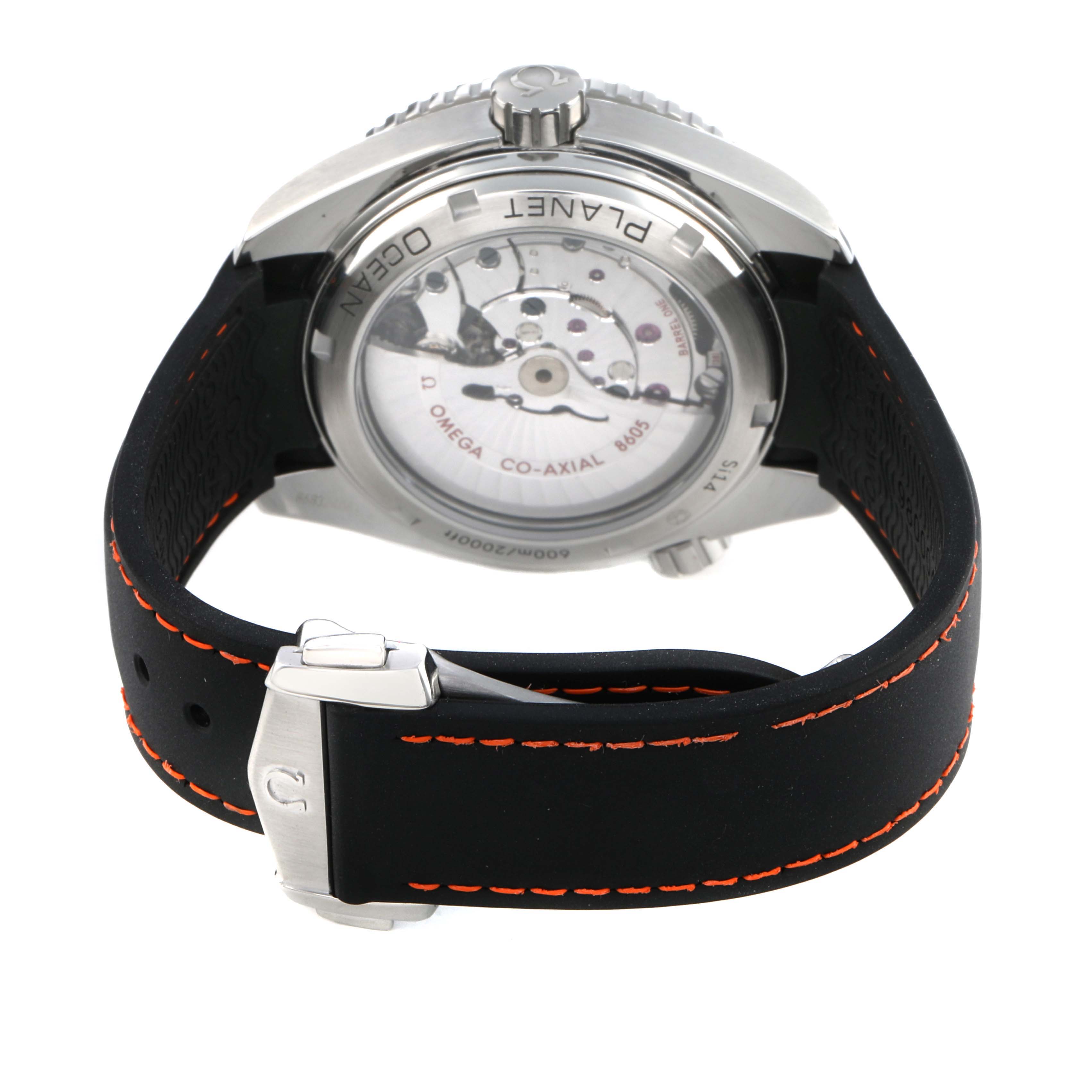 The image shows the back case and strap of the Omega Planet Ocean 232.32.44.22.01.002 Men's Stainless Steel Black Dial, highlighting the movement and deployment clasp.