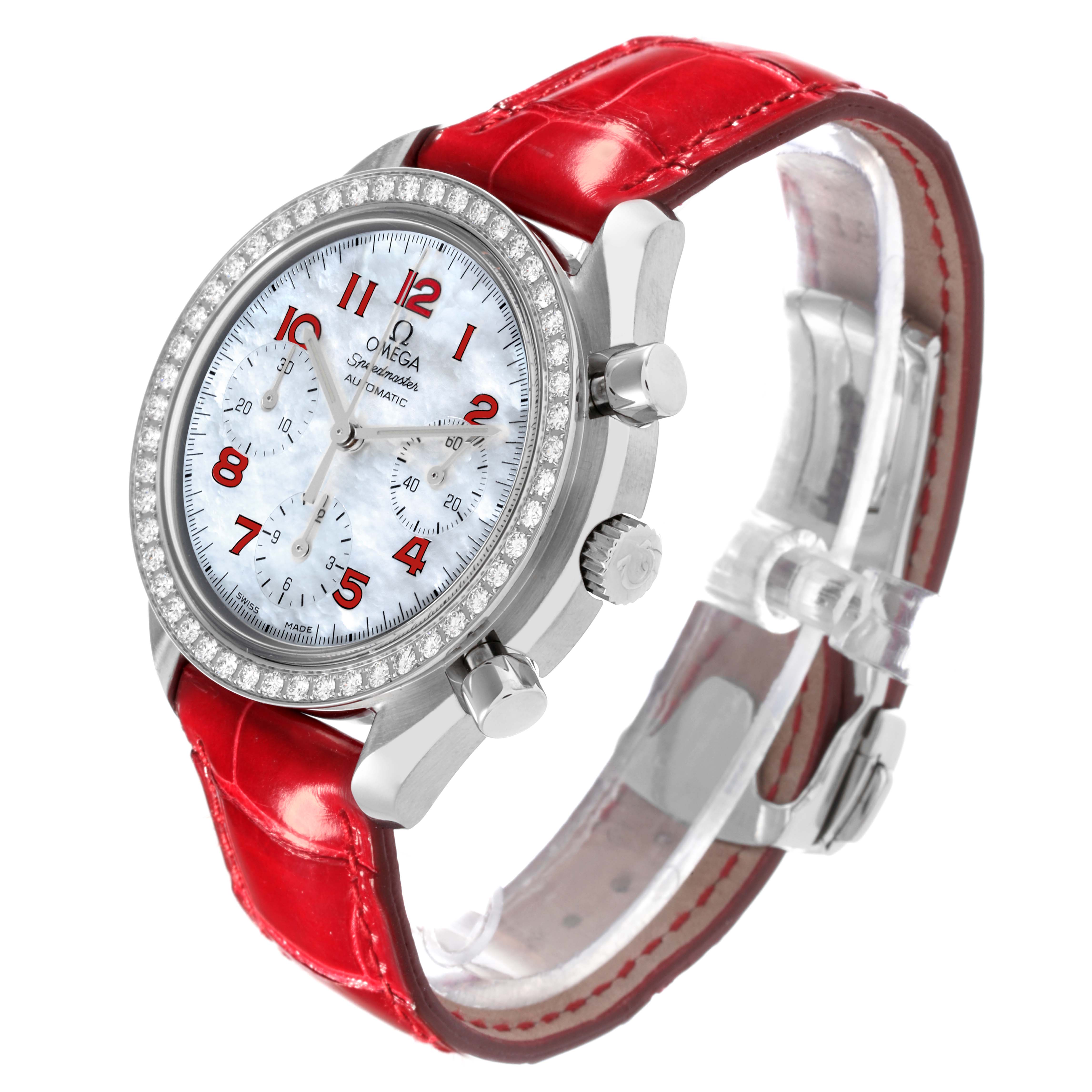 The Omega 3815.79.40 Women's Stainless Steel Mother of Pearl Dial 3815.79.40 Women's Stainless Steel Mother of Pearl Dial Speedmaster MOP Diamond watch is shown at a three-quarter view, highlighting its red strap, diamond bezel, and mother-of-pearl dial.