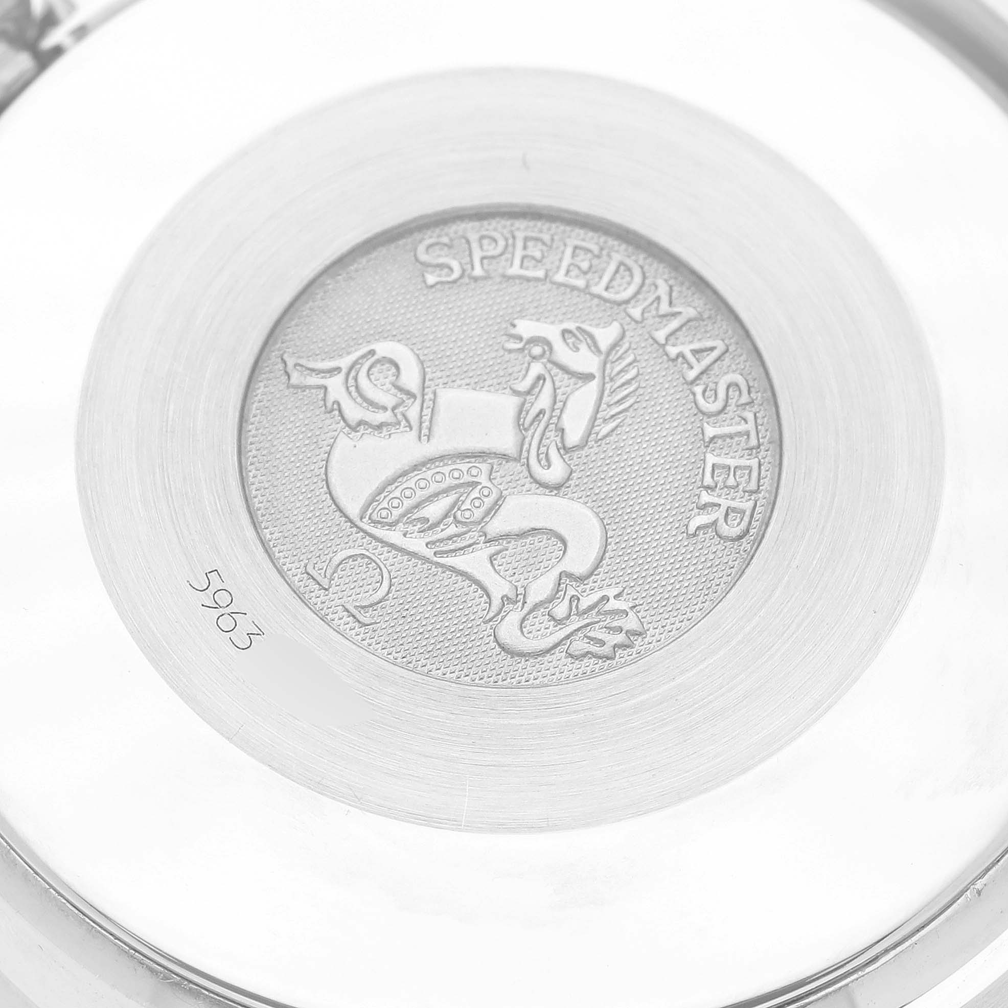 This image shows the case back of an Omega Speedmaster 3834.74.34 Men's Stainless Steel Mother of Pearl Dial 3834.74.34 Men's Stainless Steel Mother of Pearl Dial watch, featuring the model name and an embossed emblem.