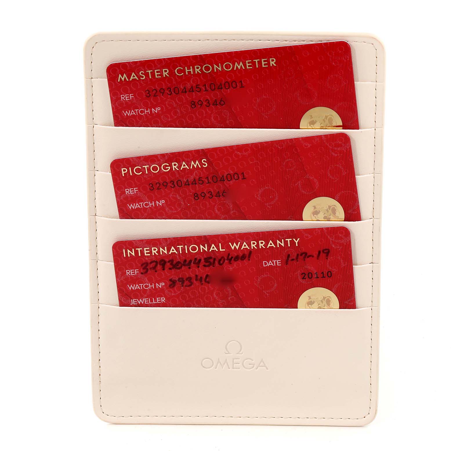 The image shows warranty and certification cards for an Omega Speedmaster 329.30.44.51.04.001 Men
s Stainless Steel Silver Dial 329.30.44.51.04.001 Men
s Stainless Steel Silver Dial, neatly arranged in a cardholder.