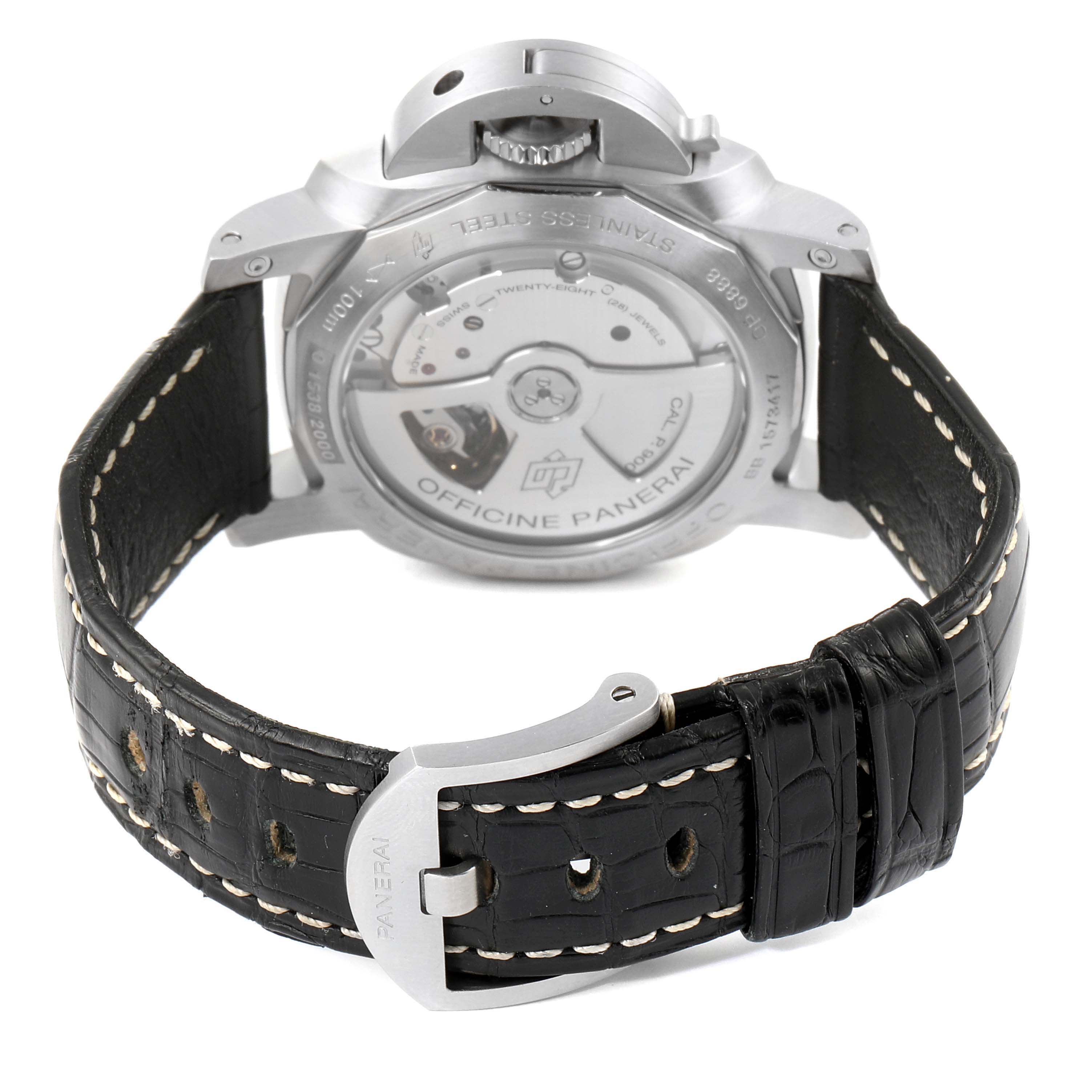 The image shows the back of a Panerai Luminor PAM00392 Men
s Stainless Steel Black Dial PAM00392 Men
s Stainless Steel Black Dial watch, displaying the transparent case back and black leather strap with stitching.