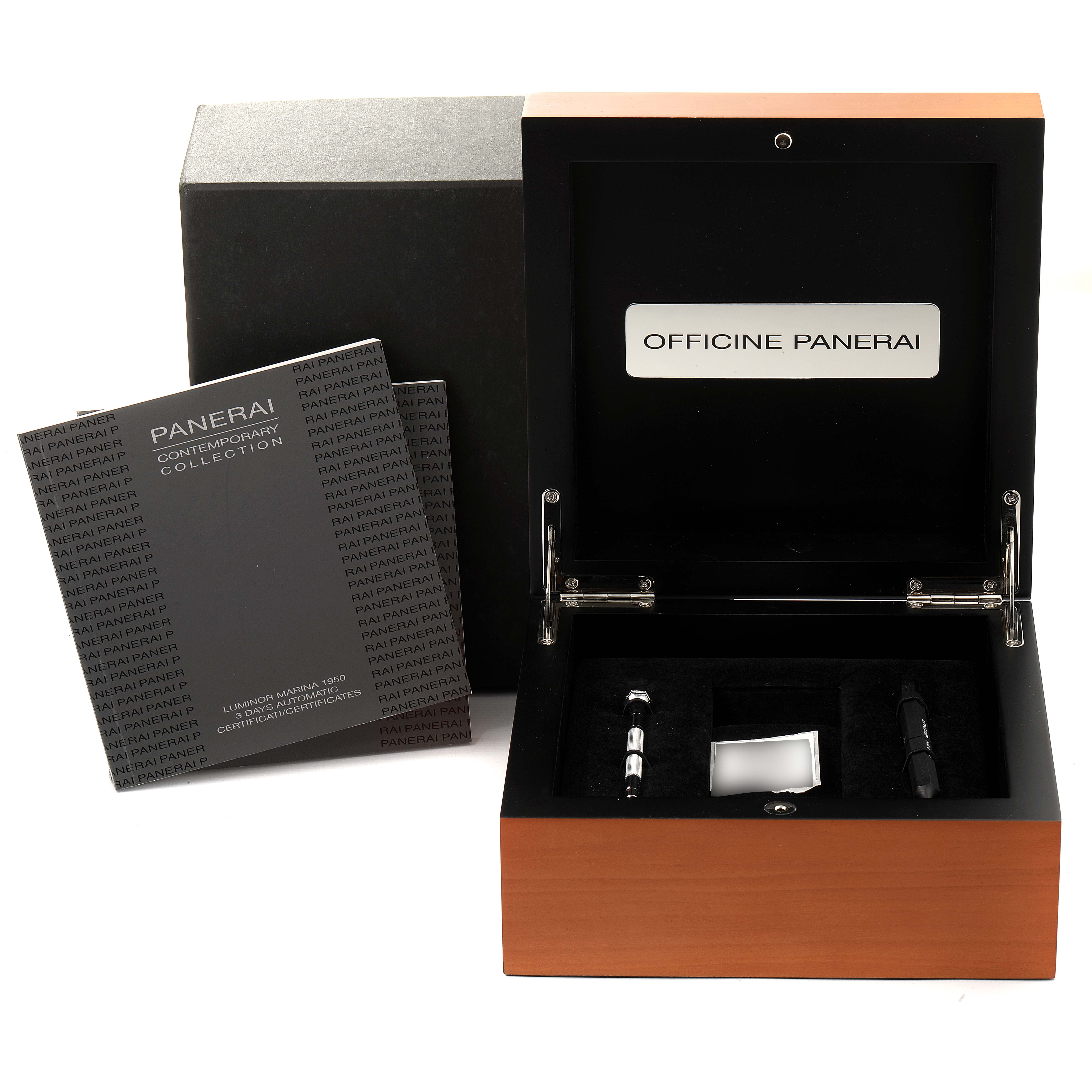 The image shows the accessories and packaging for a Panerai Luminor PAM00392 Men
s Stainless Steel Black Dial PAM00392 Men
s Stainless Steel Black Dial model, including a box, tools, and documentation.