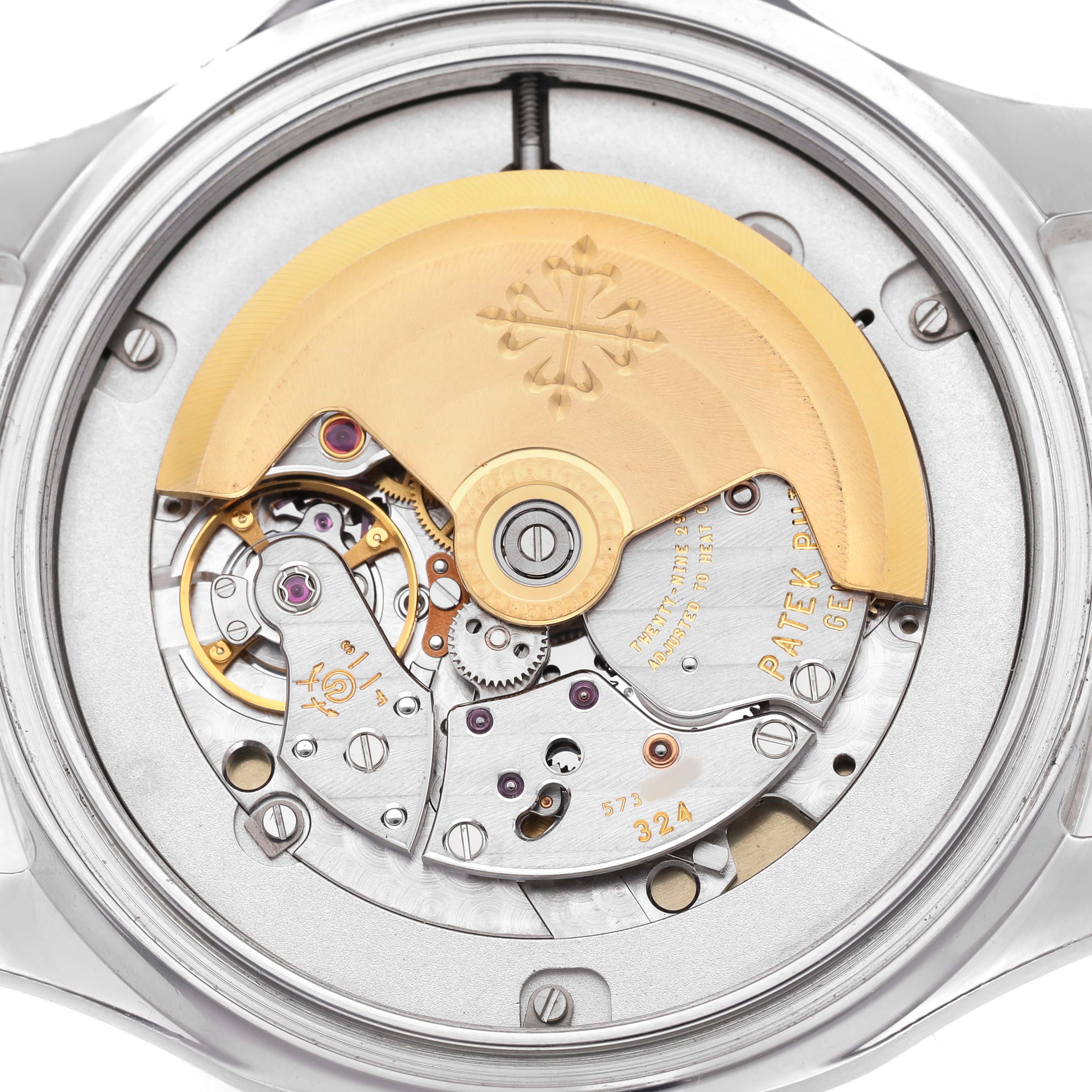 The image shows the back view of a Patek Philippe Nautilus 5167A-001 Men's Stainless Steel Grey Dial, focusing on the intricate movement and rotor.