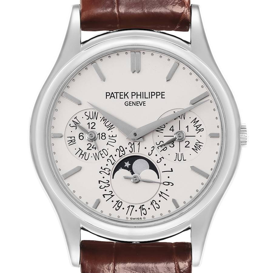 The image shows a Patek Philippe Complications watch face directly from the front, highlighting its dials, markers, and moon phase.