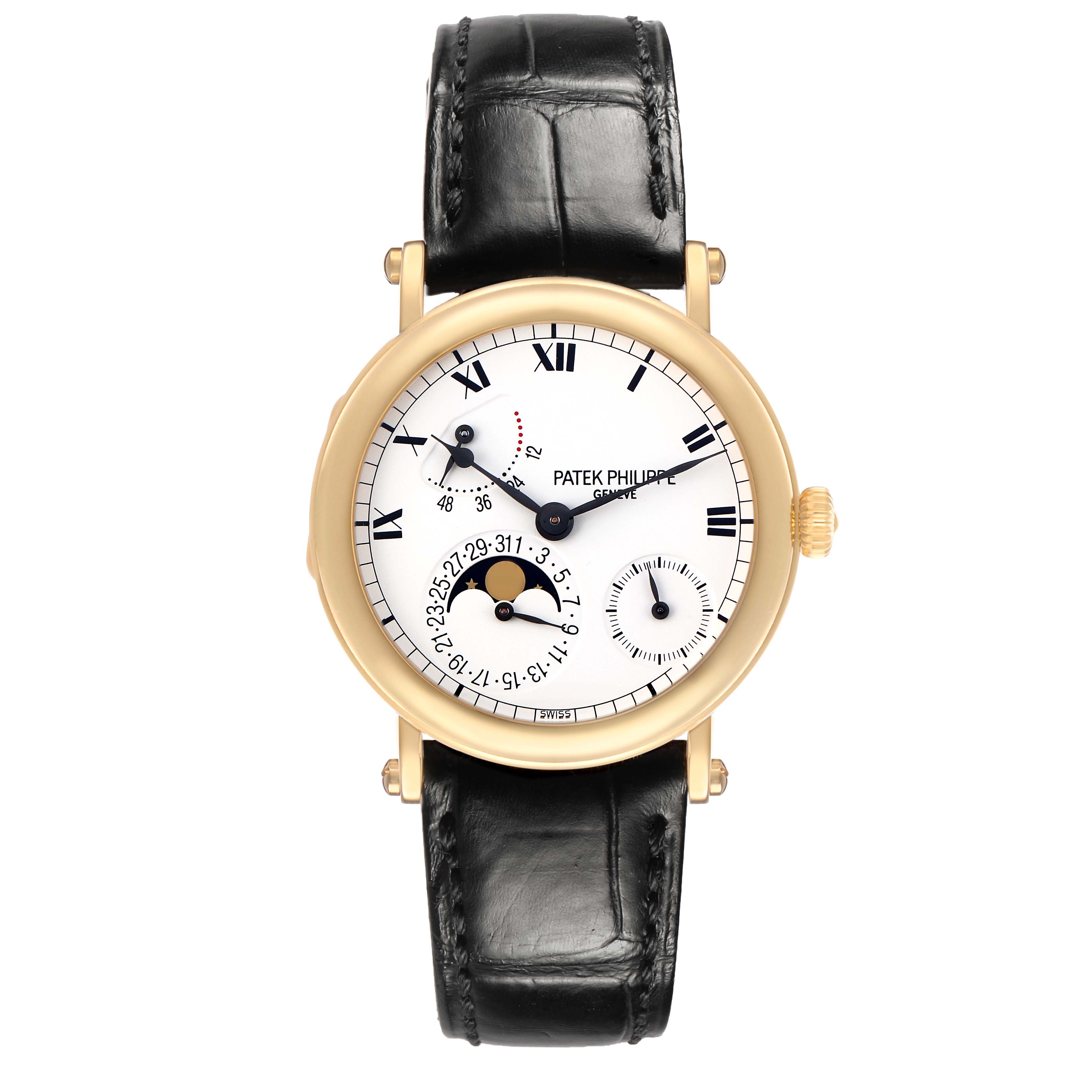 The Complications model by Patek Philippe is shown from a top view, displaying its dial, moon phase, and black leather strap.