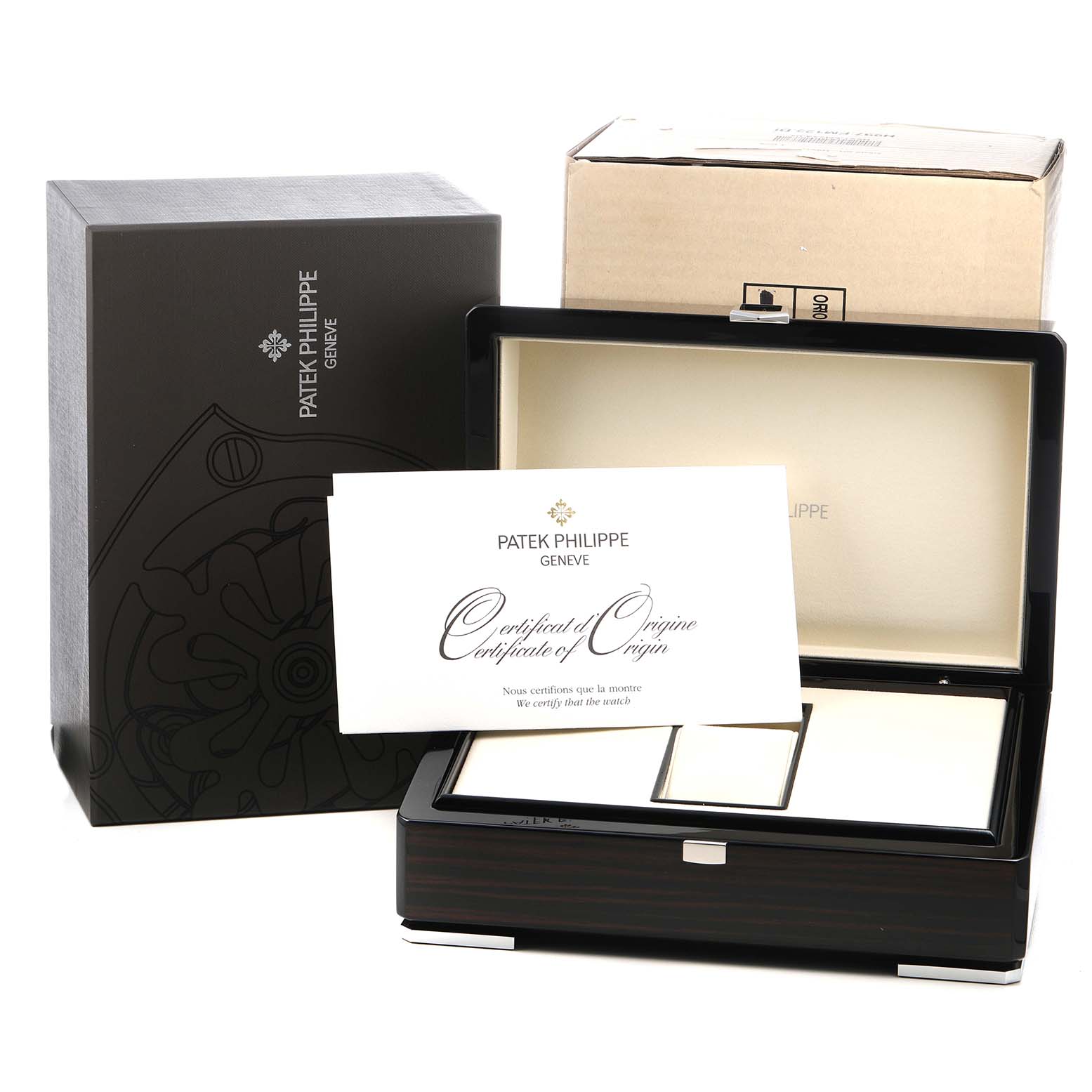 The image shows an open Patek Philippe Nautilus 5712/1A-001 Men's Stainless Steel Blue Dial watch box with a certificate of origin in front, alongside the outer packaging.