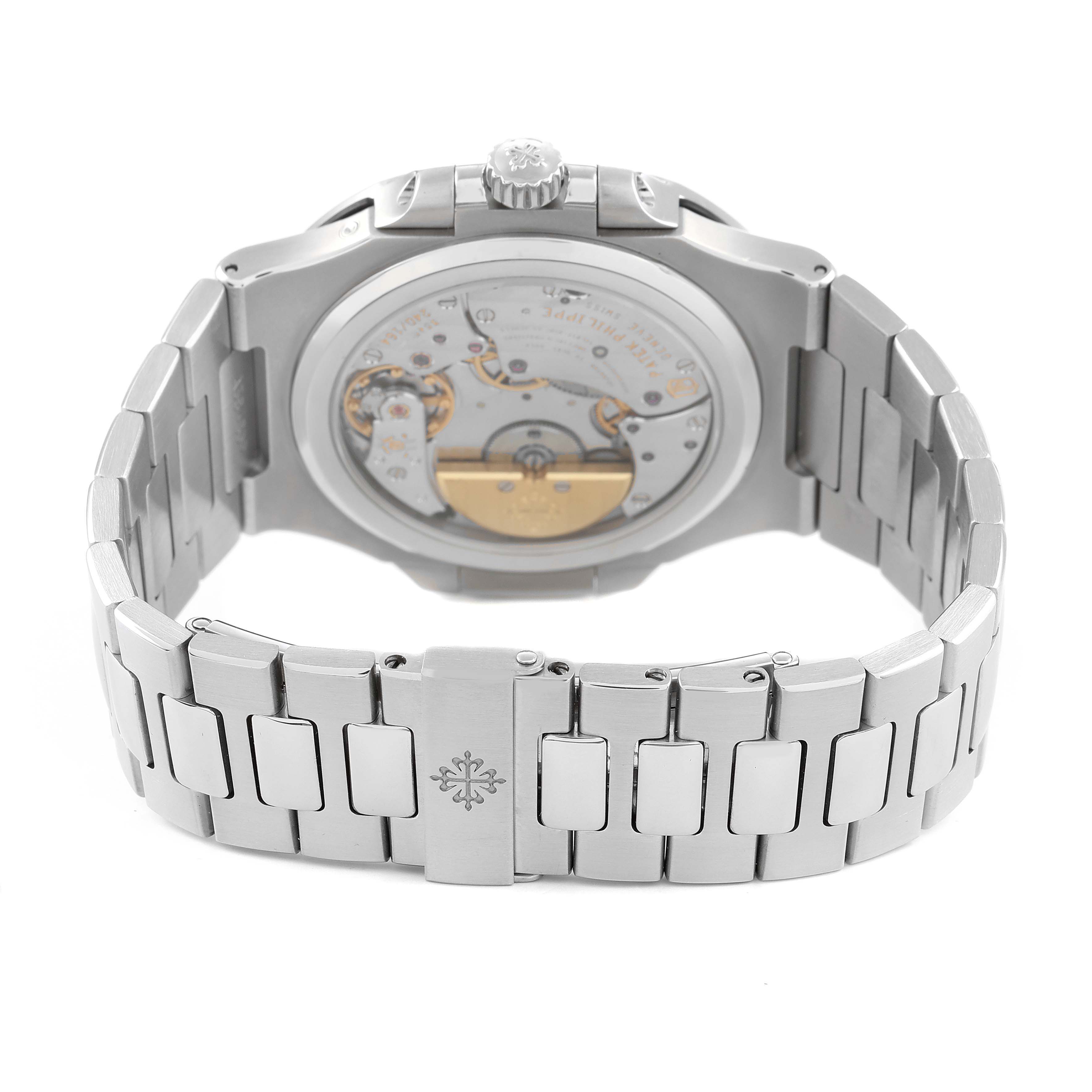 The image shows the back view of a Patek Philippe Nautilus 5712/1A-001 Men's Stainless Steel Blue Dial watch, highlighting its intricate movement and bracelet.