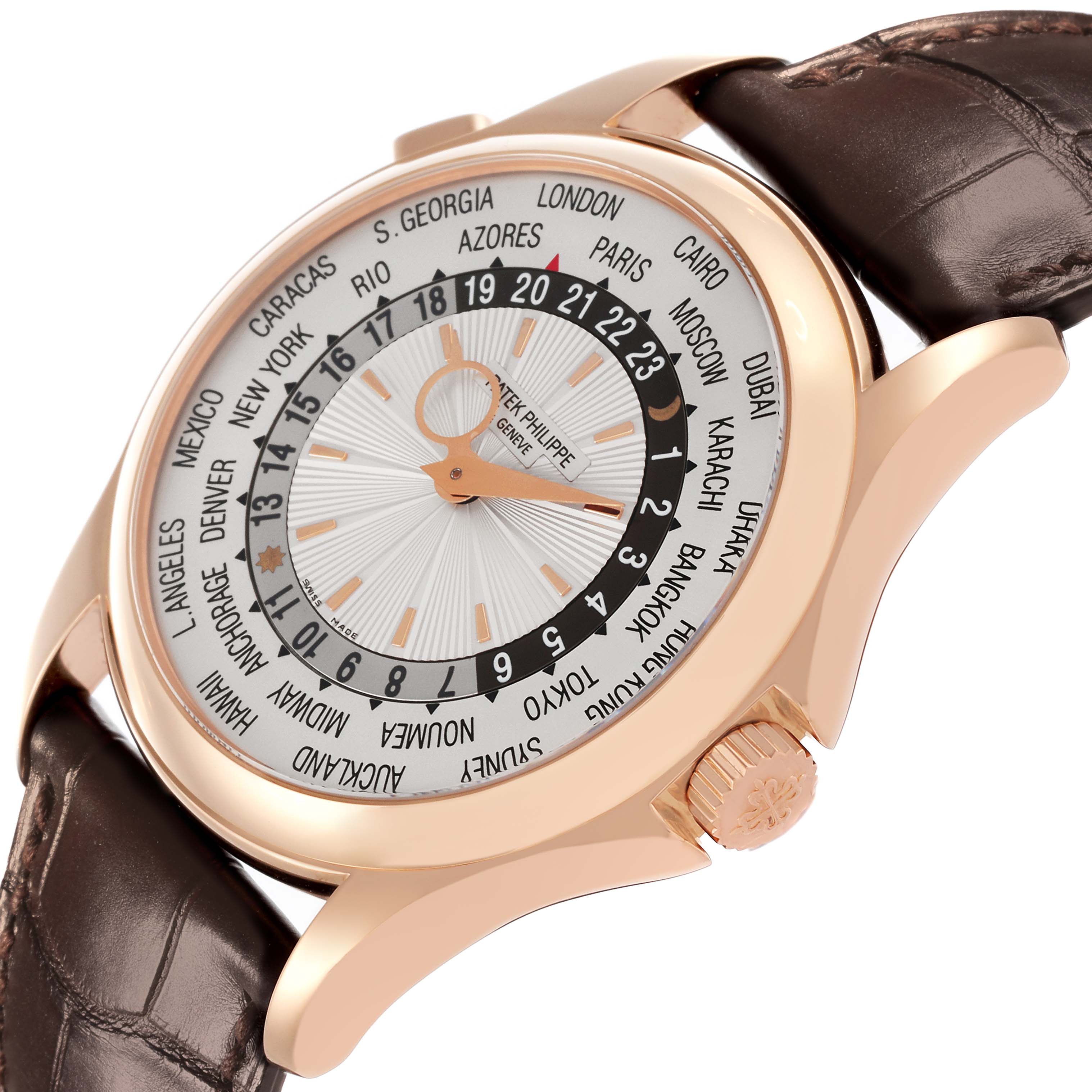 The image shows a Patek Philippe Complications 5130R-001 Men's Rose Gold Silver Dial 5130R-001 Men's Rose Gold Silver Dial watch at an angled side view, highlighting the face, bezel, crown, and brown leather strap.