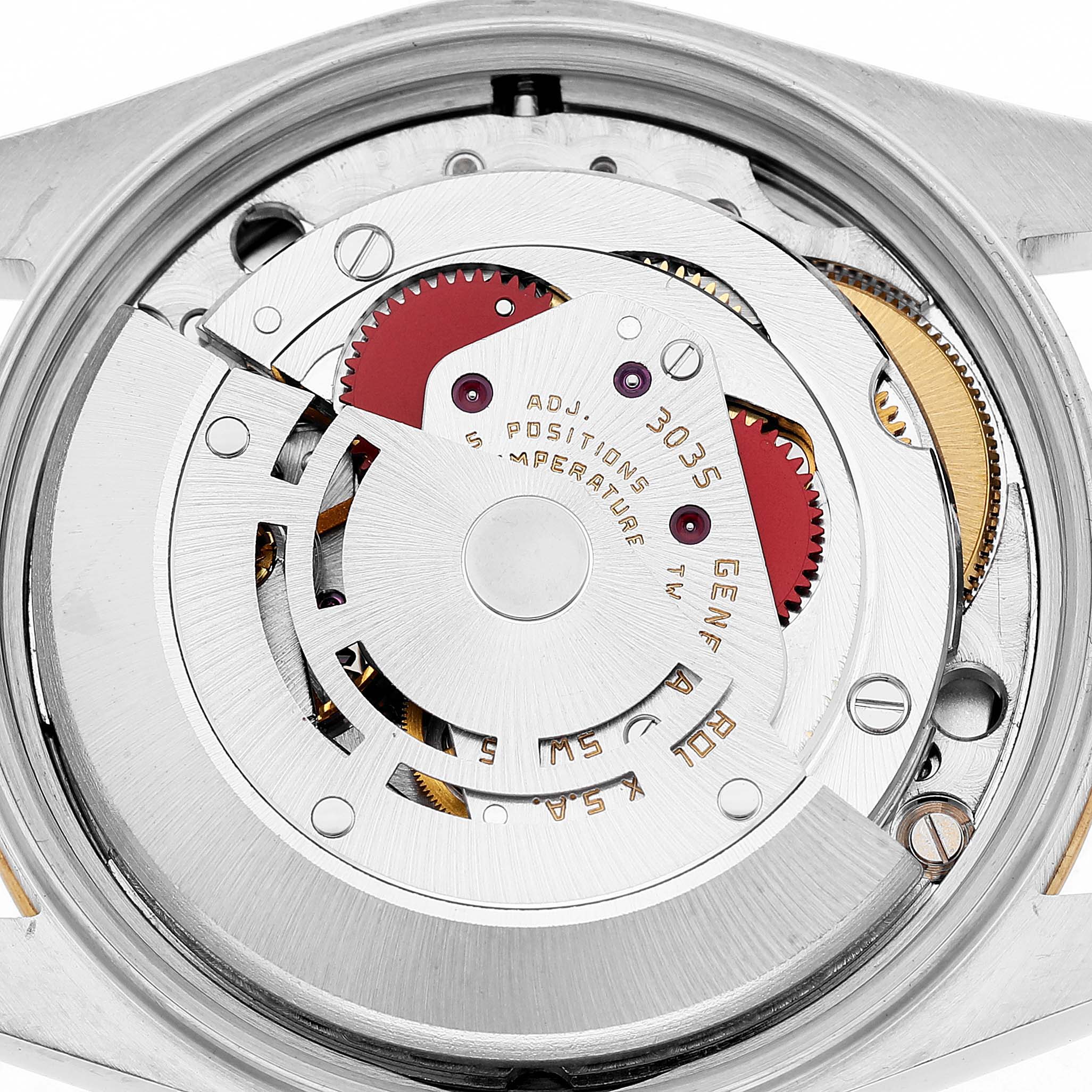 The image shows a close-up of the movement inside a Rolex Date 15053 Men's Steel and Gold (two tone) Champagne Dial watch, highlighting its mechanical components.