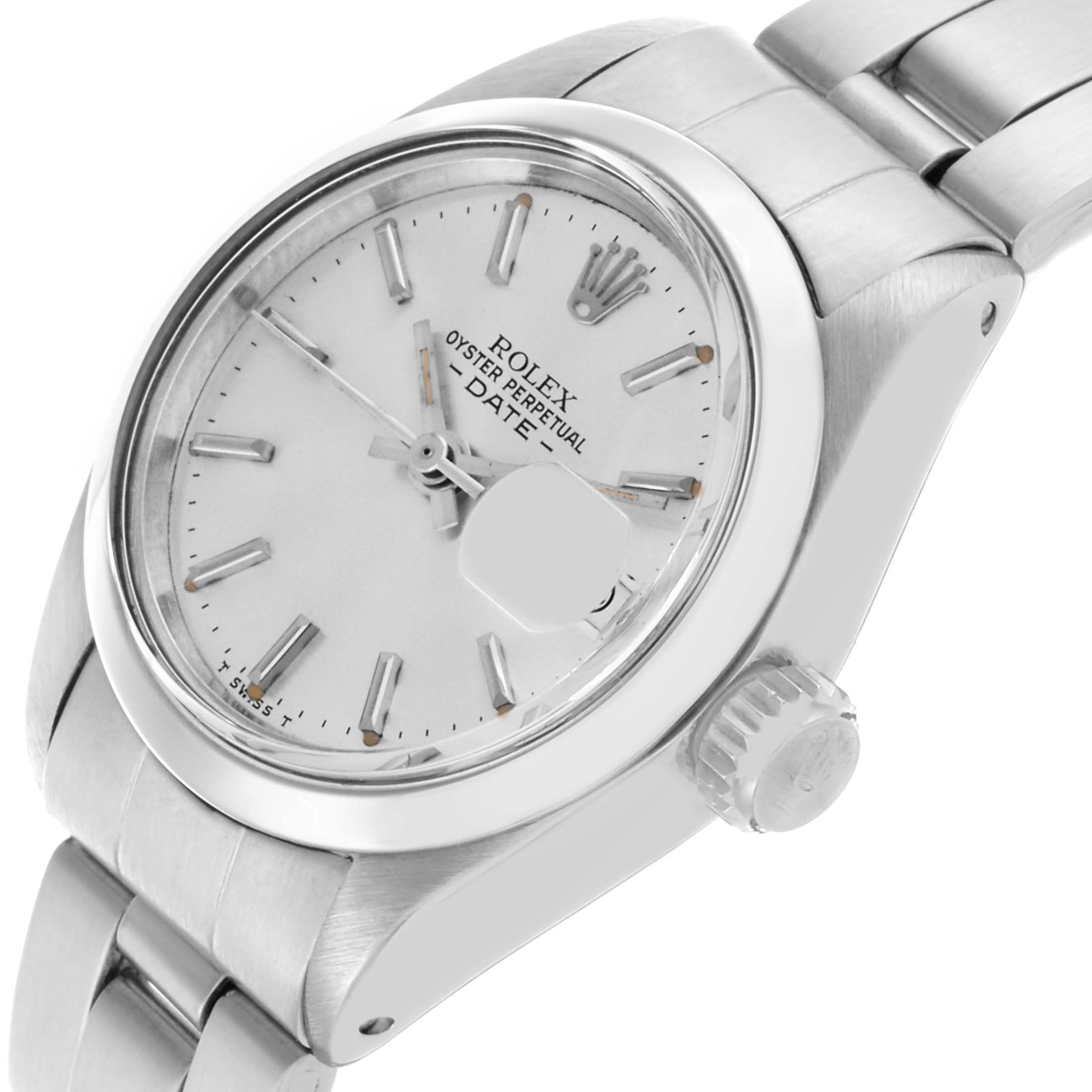 The Rolex Date 6916 Women's Stainless Steel Silver Dial 6916 Women's Stainless Steel Silver Dial watch is shown at an angled view highlighting the dial, bezel, crown, and part of the bracelet.