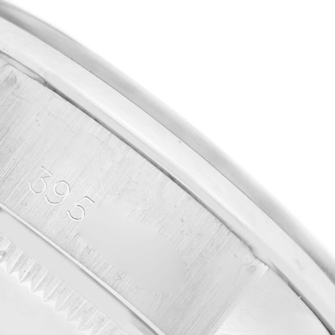 This close-up image shows the side profile of the case and bezel of a Rolex Date 6916 Women's Stainless Steel Silver Dial 6916 Women's Stainless Steel Silver Dial model watch.