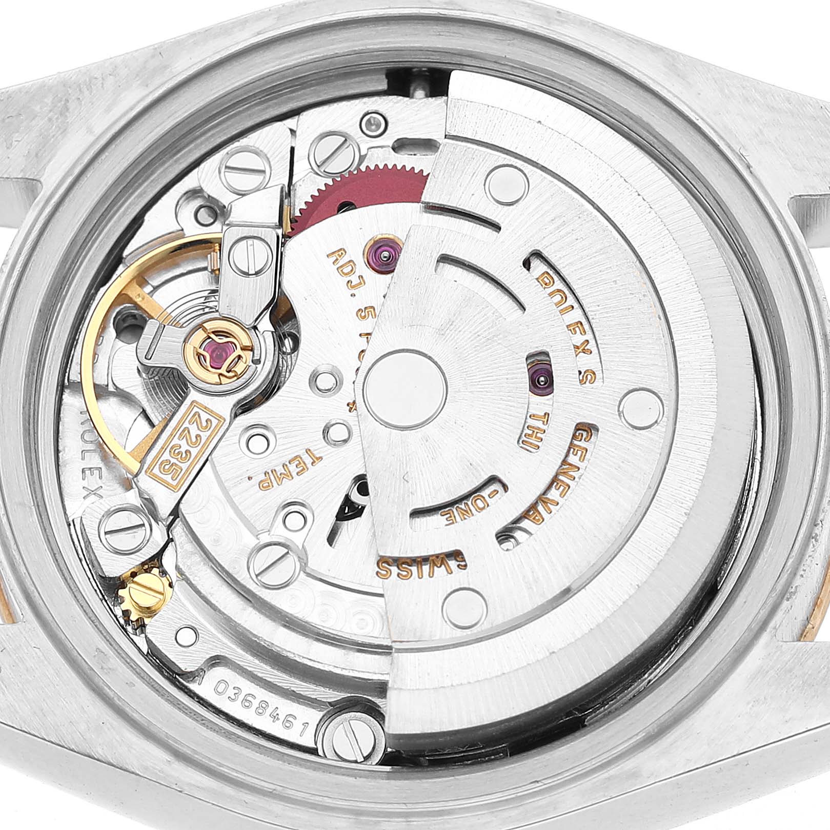 The image shows the movement of a Rolex Datejust 79163 Women's Steel and Gold (two tone) Silver Dial, highlighting the rotor, gears, and balance wheel from a back angle.