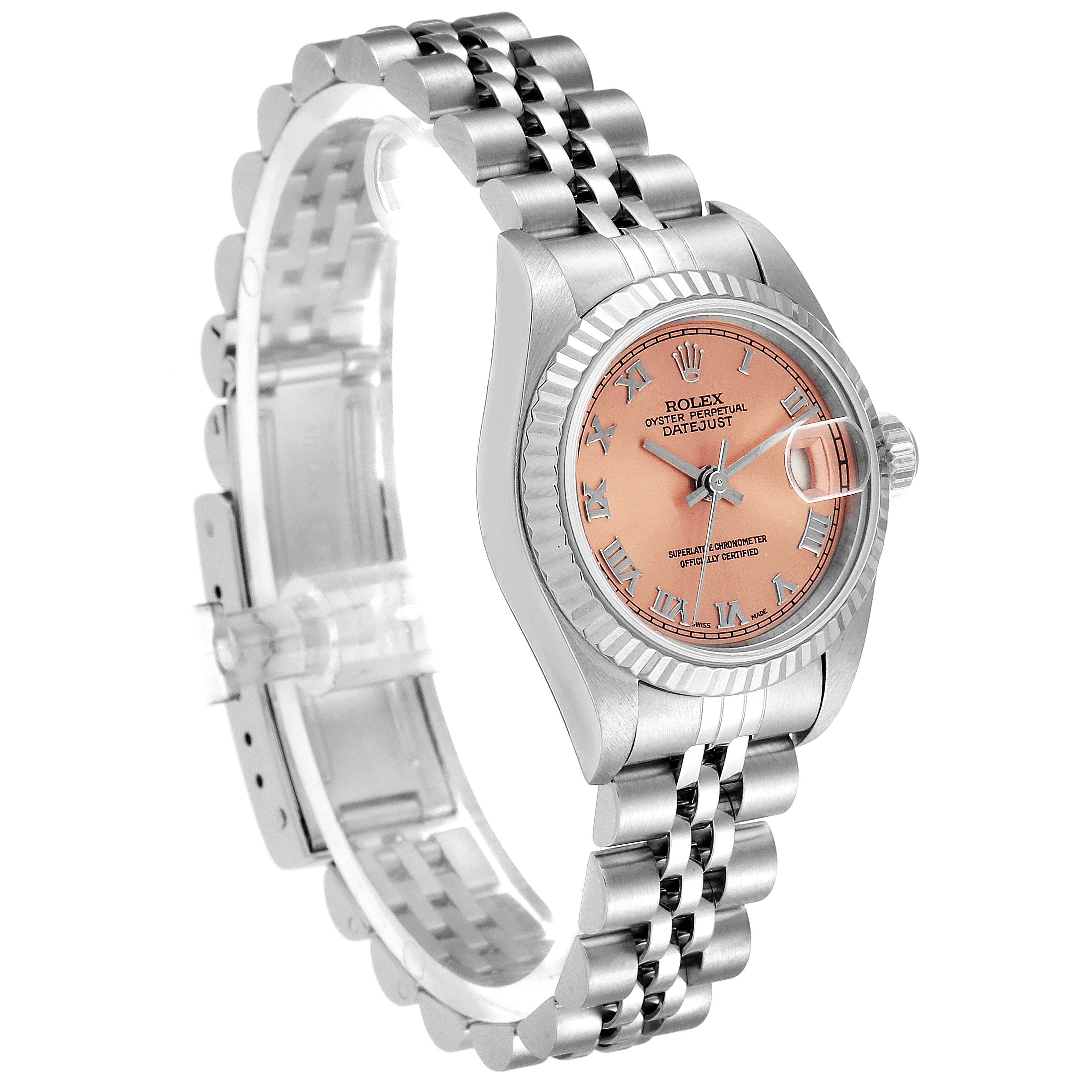 This image shows a Rolex Datejust 79174 Women's Stainless Steel Pink Dial 79174 Women's Stainless Steel Pink Dial watch at a 3/4 angle, highlighting its face, bezel, crown, and Jubilee bracelet.