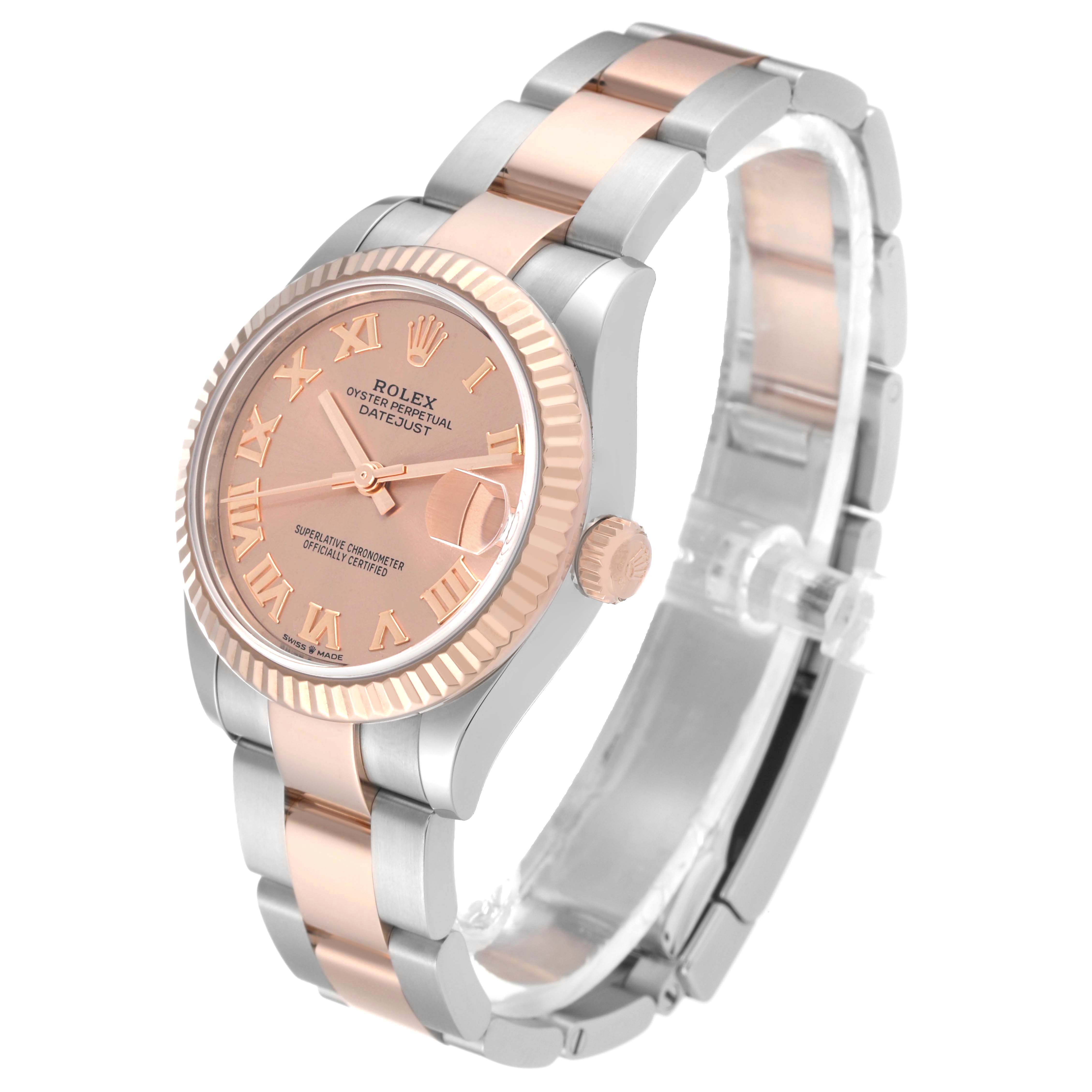 The Rolex Mid-Size 278271 Women's Steel and Gold (two tone) Pink Dial 278271 Women's Steel and Gold (two tone) Pink Dial watch is shown at a front-side angle, displaying the dial, crown, bezel, and bracelet.