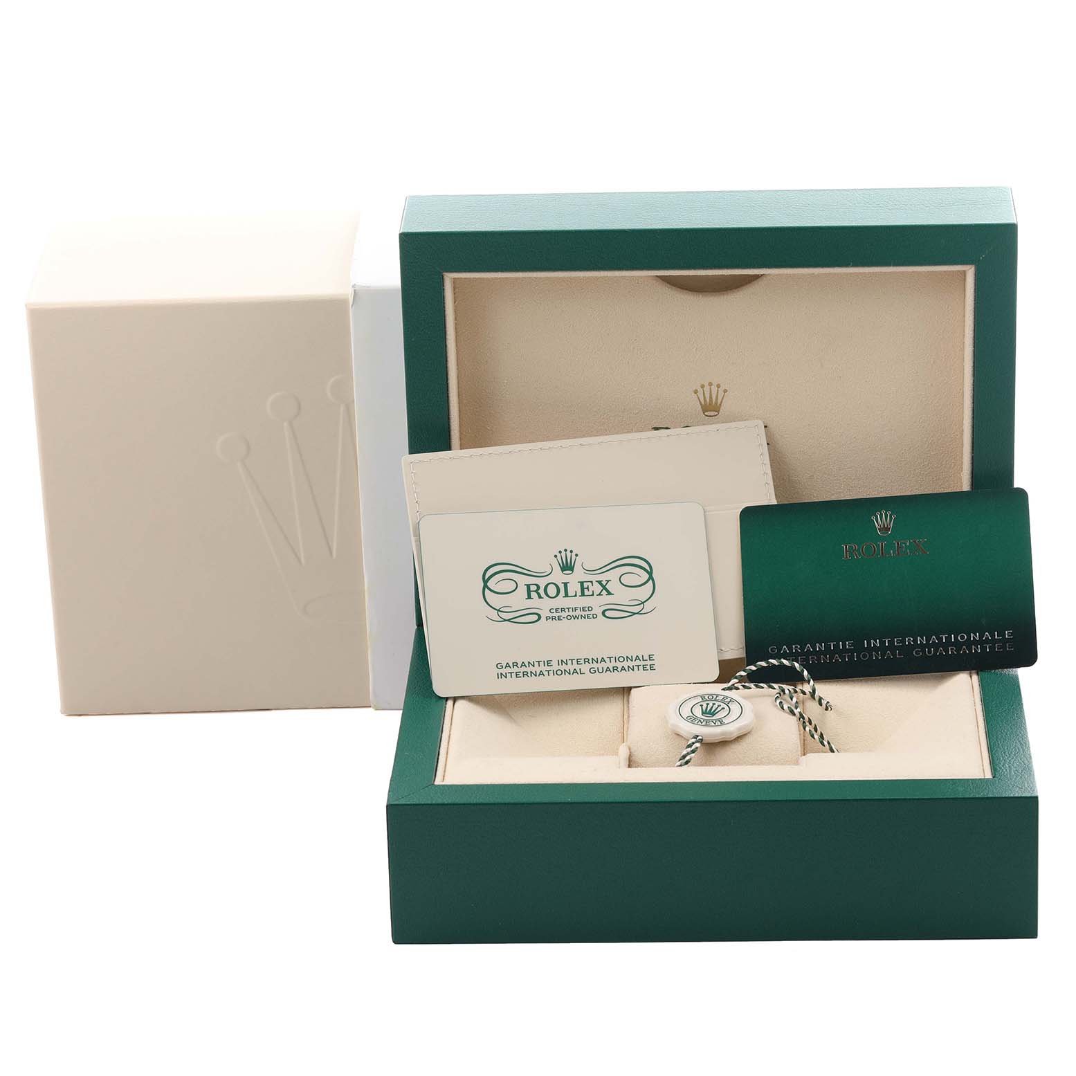 The image shows the packaging of a Rolex Mid-Size 278271 Women's Steel and Gold (two tone) Pink Dial 278271 Women's Steel and Gold (two tone) Pink Dial model including a green box, guarantee cards, and accessories, viewed from the front.