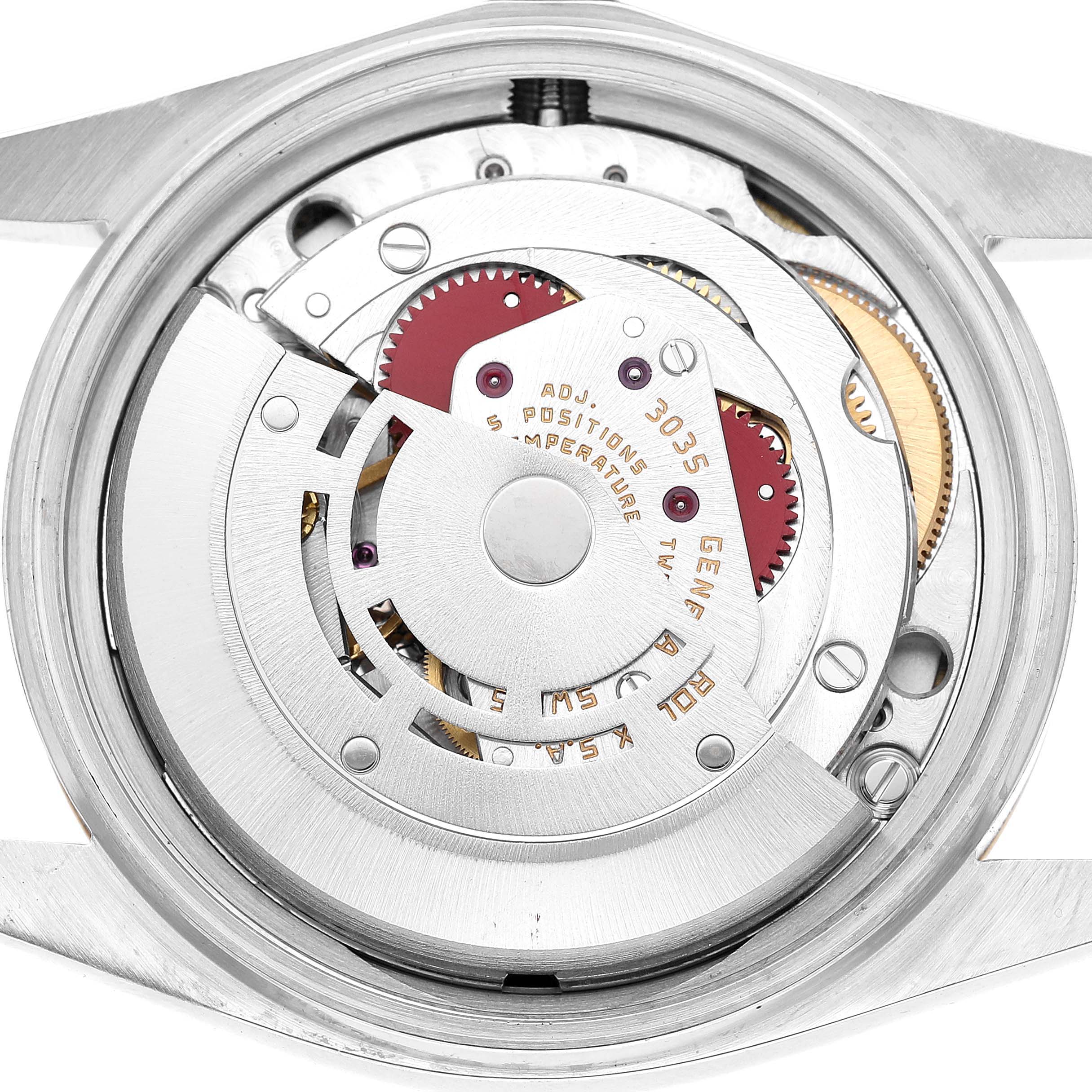 The image shows the movement and inner mechanism of a Rolex Datejust 16013 Men's Steel and Gold (two tone) Black Dial watch, viewed from the back.