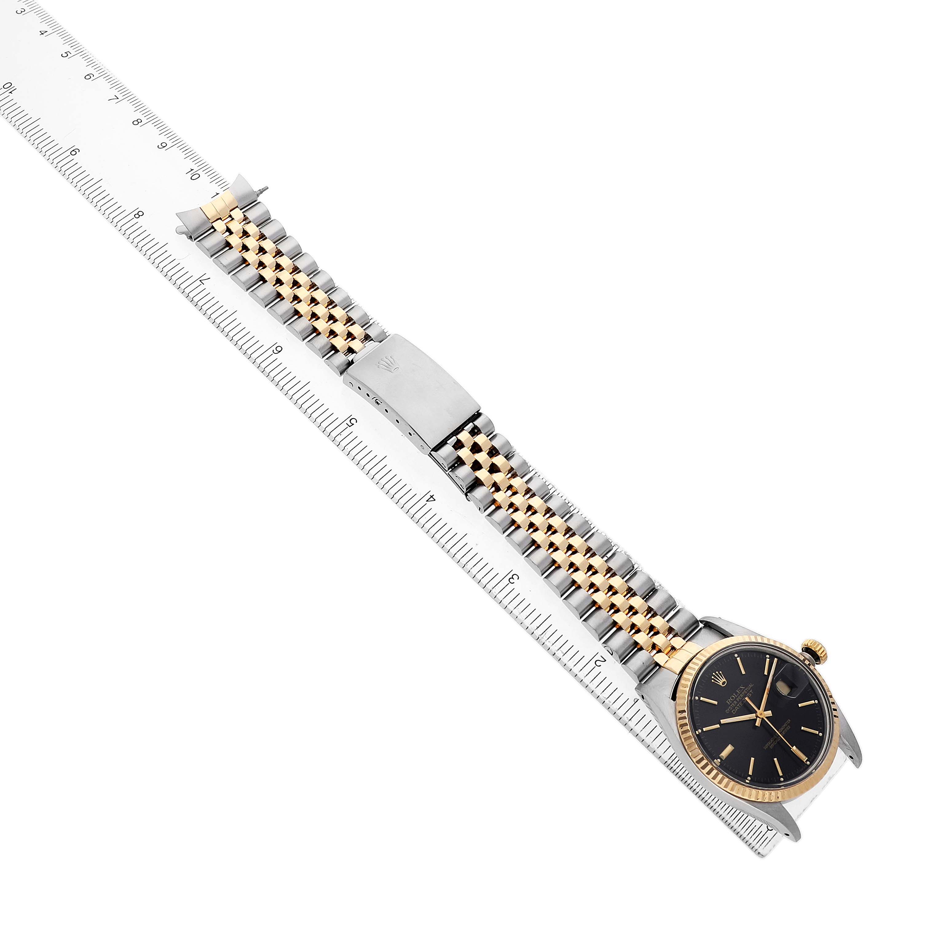 The Rolex Datejust 16013 Men's Steel and Gold (two tone) Black Dial watch is shown from an angled top view, highlighting its two-tone bracelet and black dial.