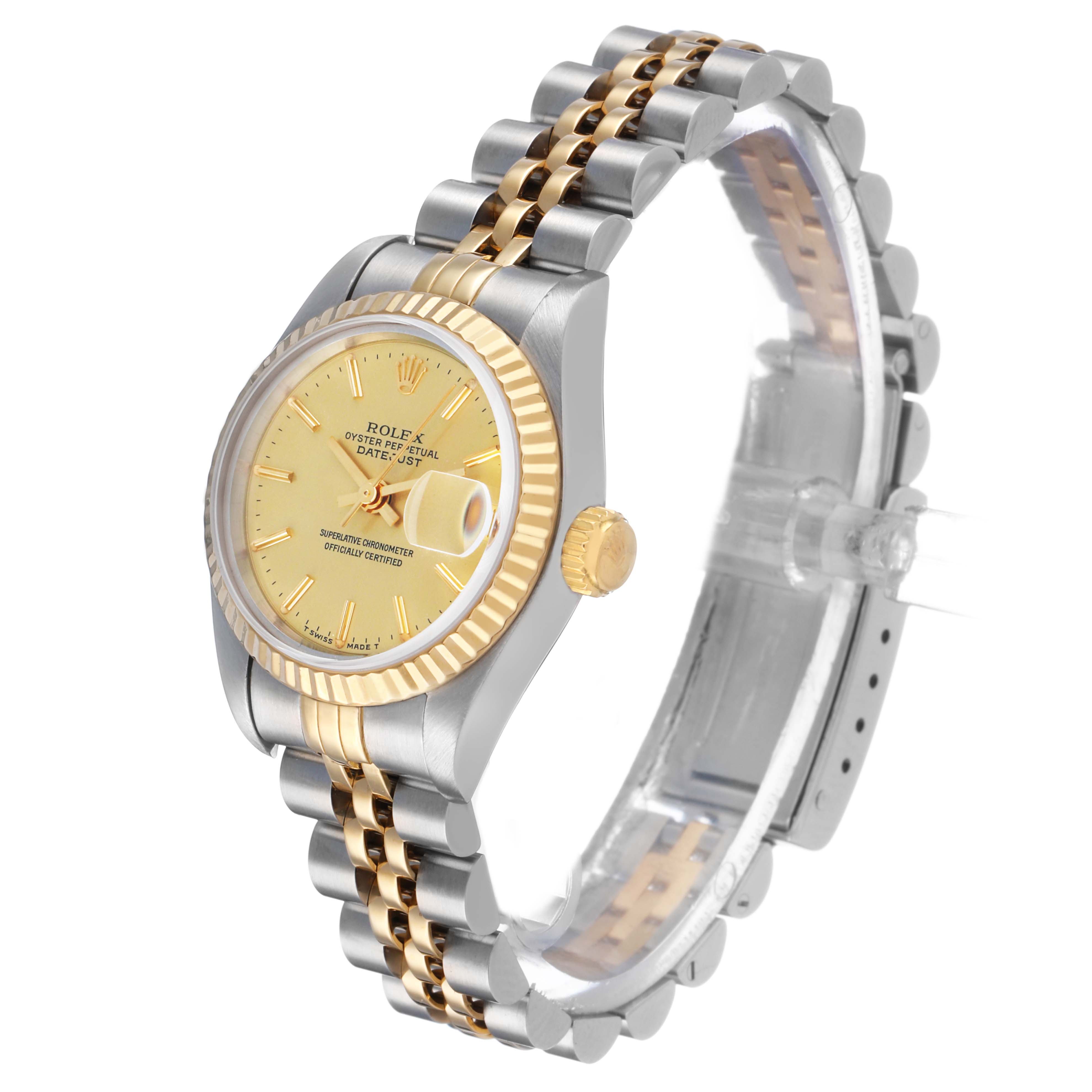 The Rolex Datejust 69173 Women's Steel and Gold (two tone) Champagne Dial watch is shown at an angled side view, highlighting the face, bezel, crown, and two-tone bracelet.