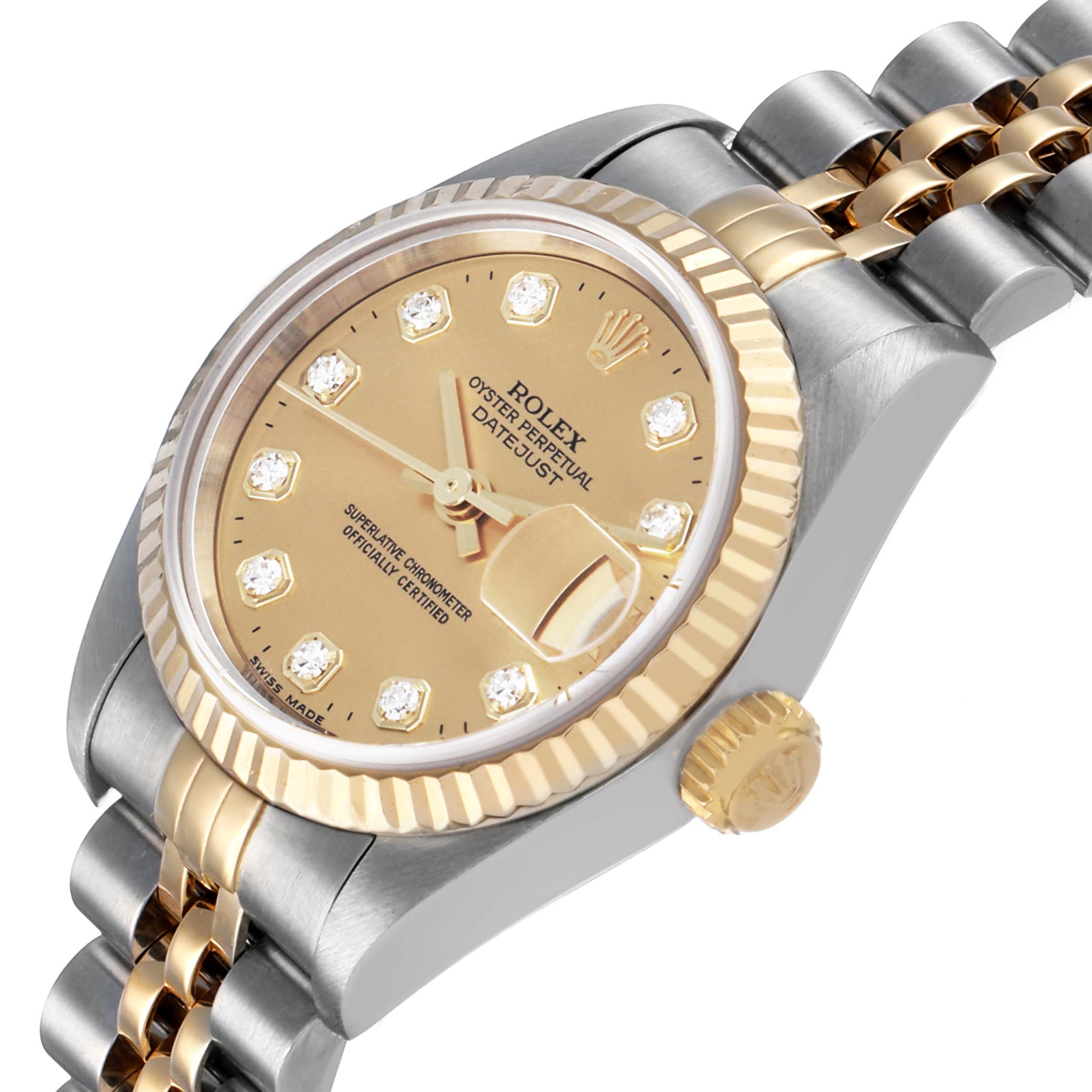 The Rolex Datejust 79173 Women's Steel and Gold (two tone) Champagne Dial watch is shown at a close angle highlighting the dial, bezel, crown, and part of the bracelet.
