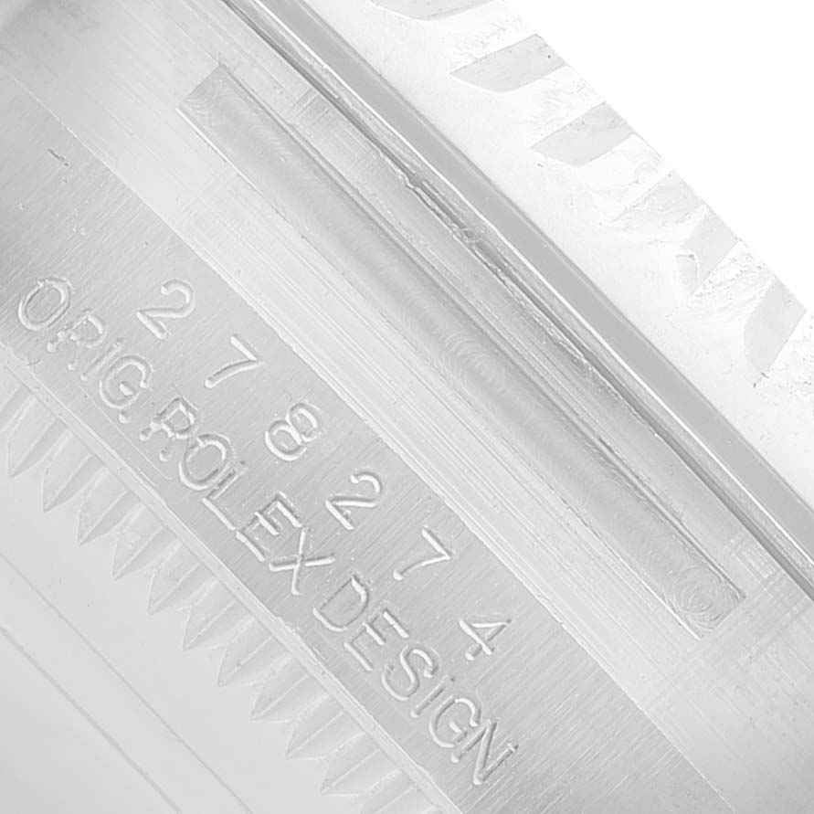 The image shows a close-up of the engraving on the side of a Rolex Datejust 278274 Women's Stainless Steel Grey Dial watch case, displaying model numbers and "ORIG ROLEX DESIGN."