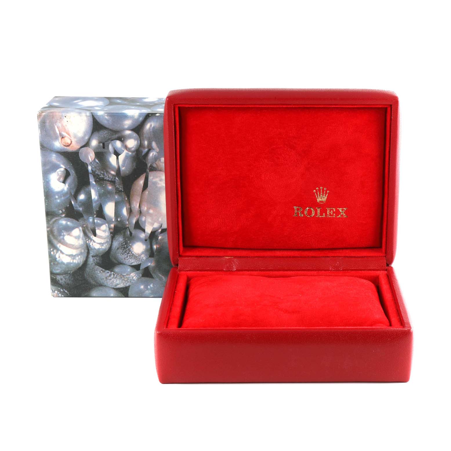 The image shows a red Rolex watch box, likely for a President model, with the lid open, displaying the interior and a separate outer box.
