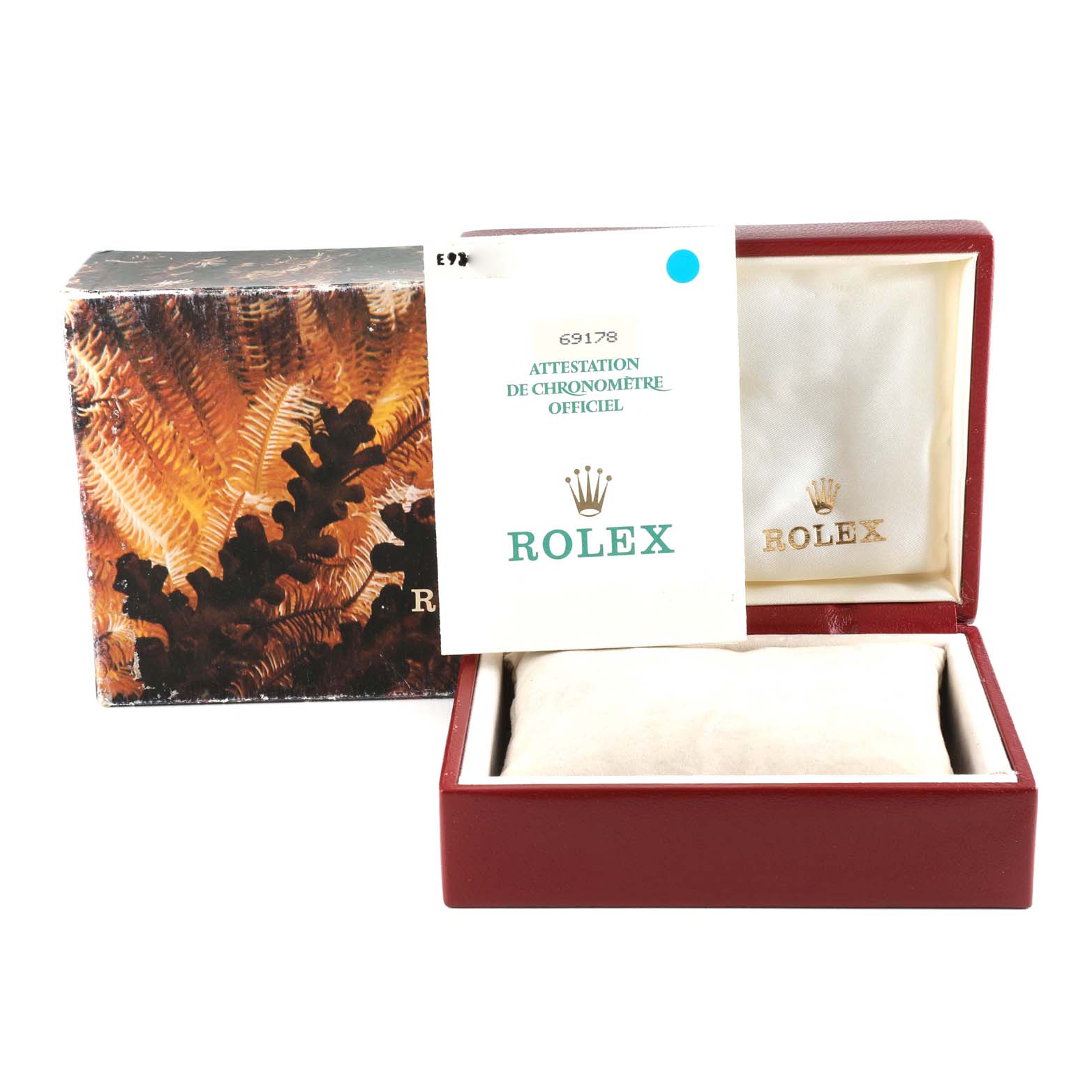 The image shows the packaging and warranty card for the Rolex President 69178 Women's Yellow Gold Champagne Dial 69178 Women's Yellow Gold Champagne Dial model watch.