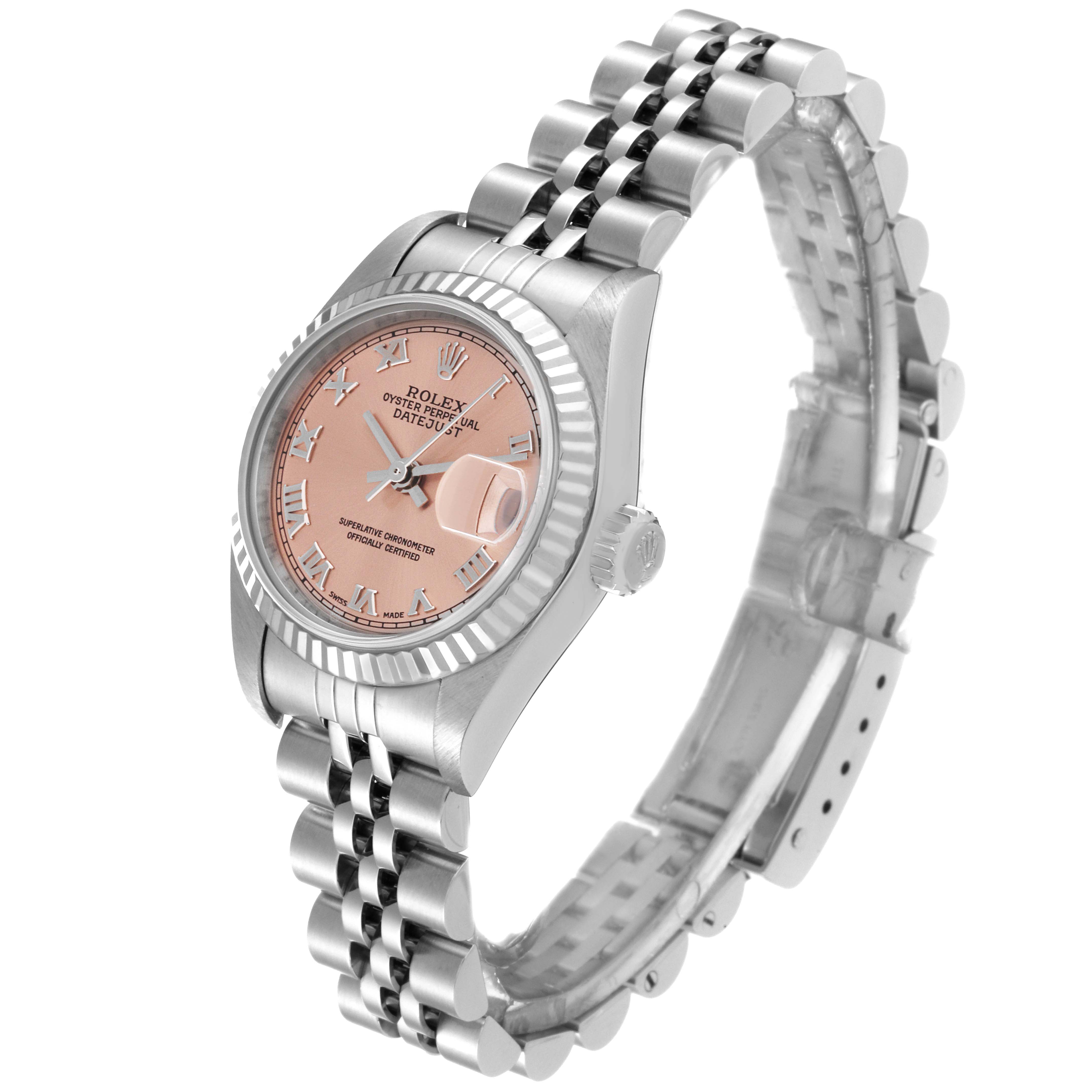 The image shows a Rolex Datejust 79174 Women's Stainless Steel Pink Dial 79174 Women's Stainless Steel Pink Dial watch at a three-quarter angle, highlighting the pink dial, fluted bezel, and Jubilee bracelet.