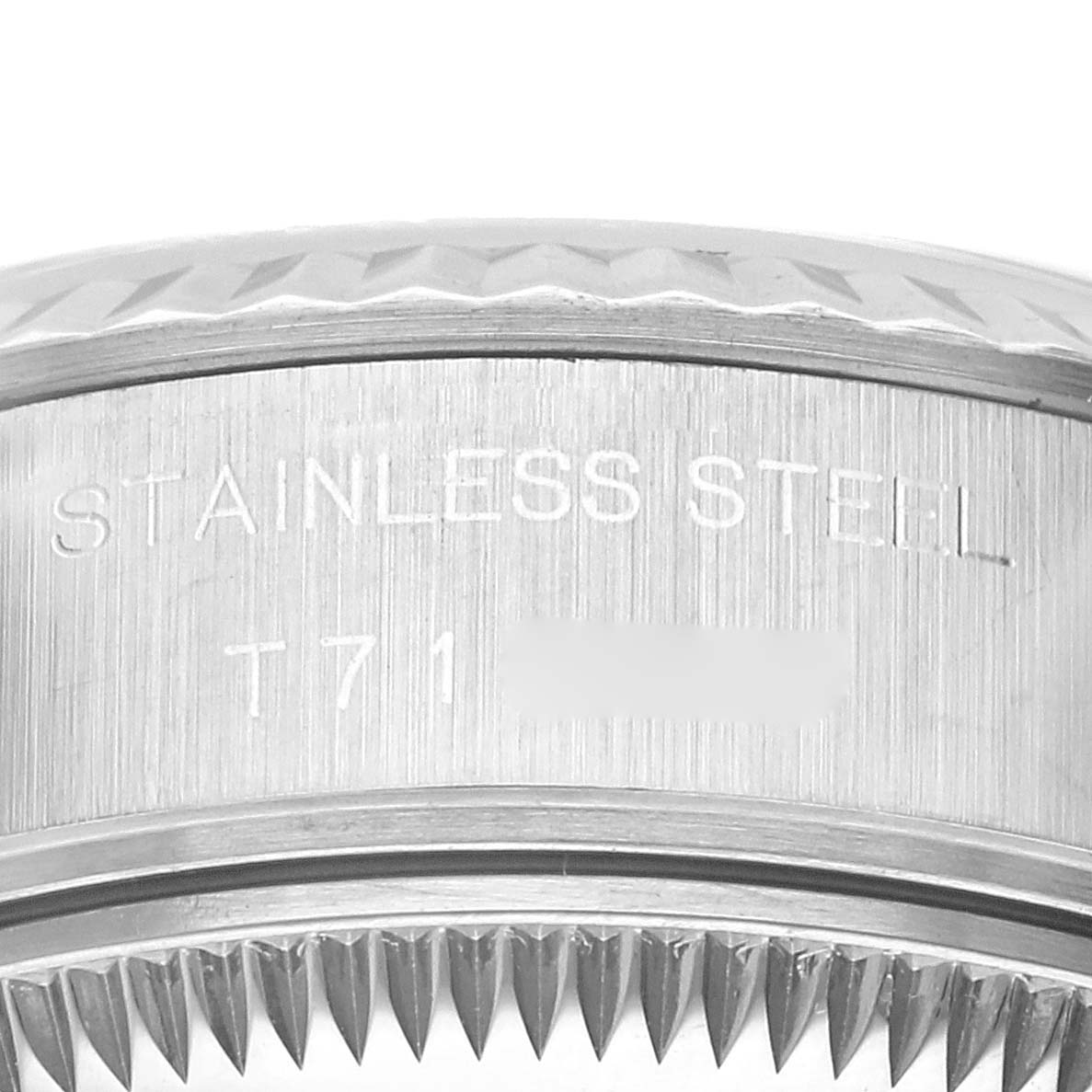 This image shows a close-up view of the side bezel and the engraving on a Rolex Datejust 69174 Women's Stainless Steel Silver Dial 69174 Women's Stainless Steel Silver Dial watch, highlighting the text "STAINLESS STEEL."