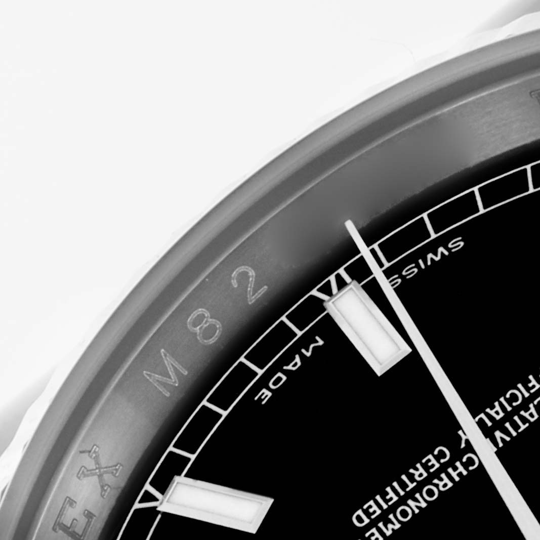 The image shows a close-up of the dial and minute track of a Rolex Datejust 116234 Men's Stainless Steel Black Dial 116234 Men's Stainless Steel Black Dial, highlighting the branding and inner markings.