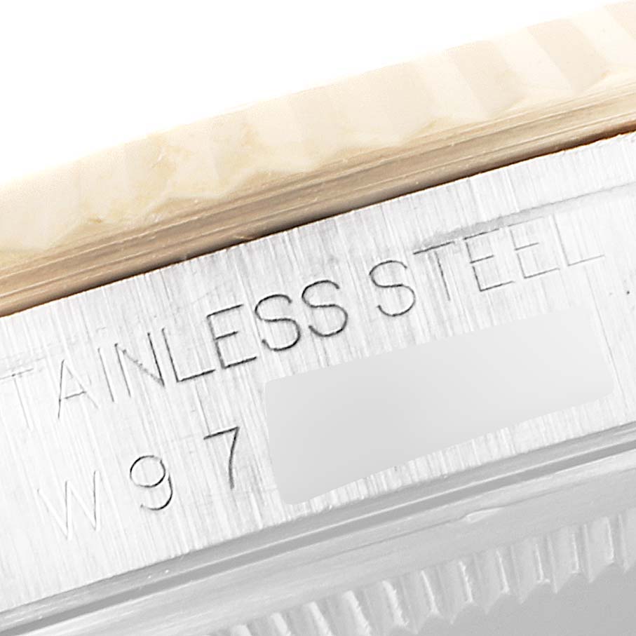 This image shows a close-up of the case side and partially visible bezel of the Rolex Datejust 16233 Men's Steel and Gold (two tone) Blue Dial 16233 Men's Steel and Gold (two tone) Blue Dial, highlighting its stainless steel material.