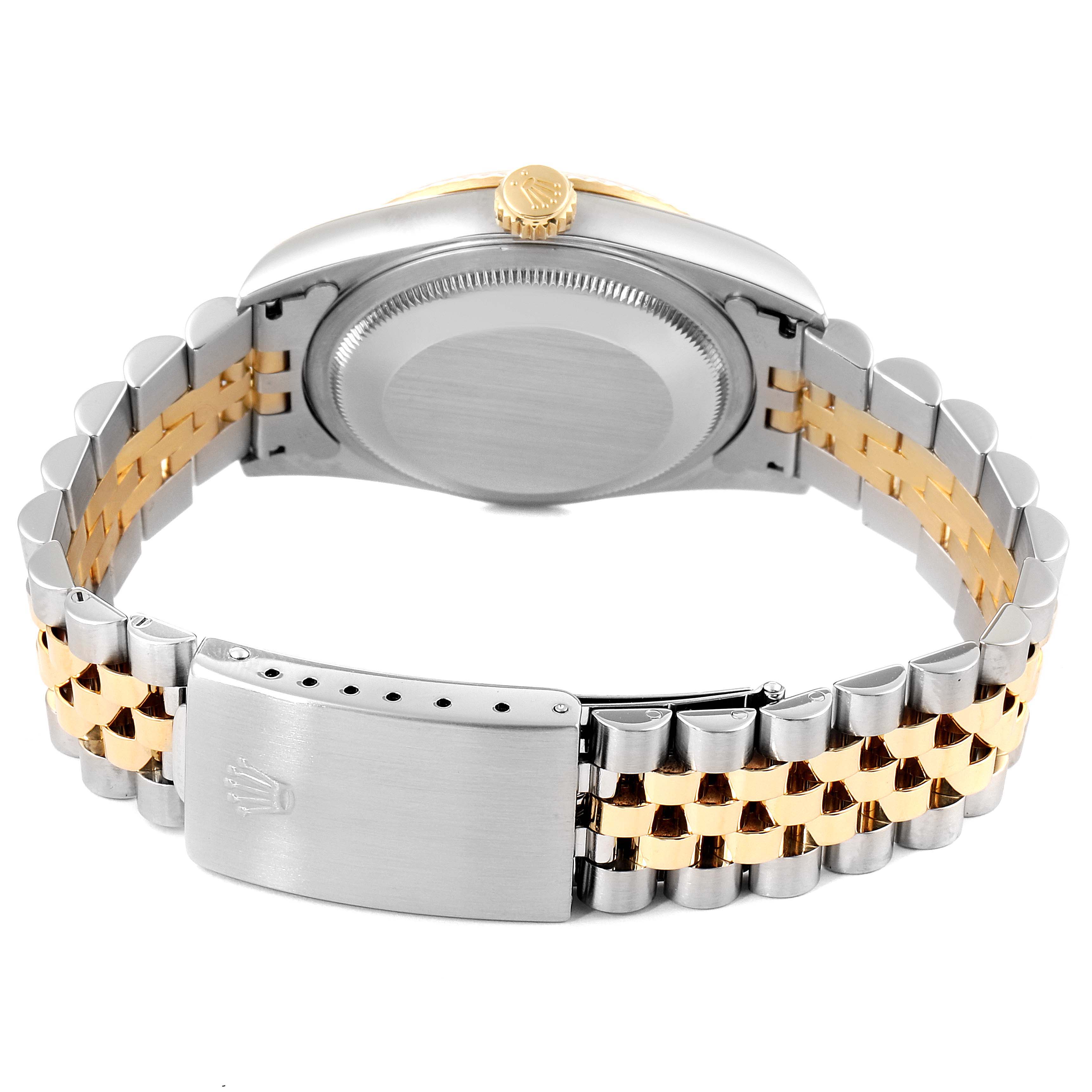 The image shows the back case, crown, and Jubilee bracelet of a Rolex Datejust 16233 Men's Steel and Gold (two tone) Blue Dial 16233 Men's Steel and Gold (two tone) Blue Dial watch from a rear angle.