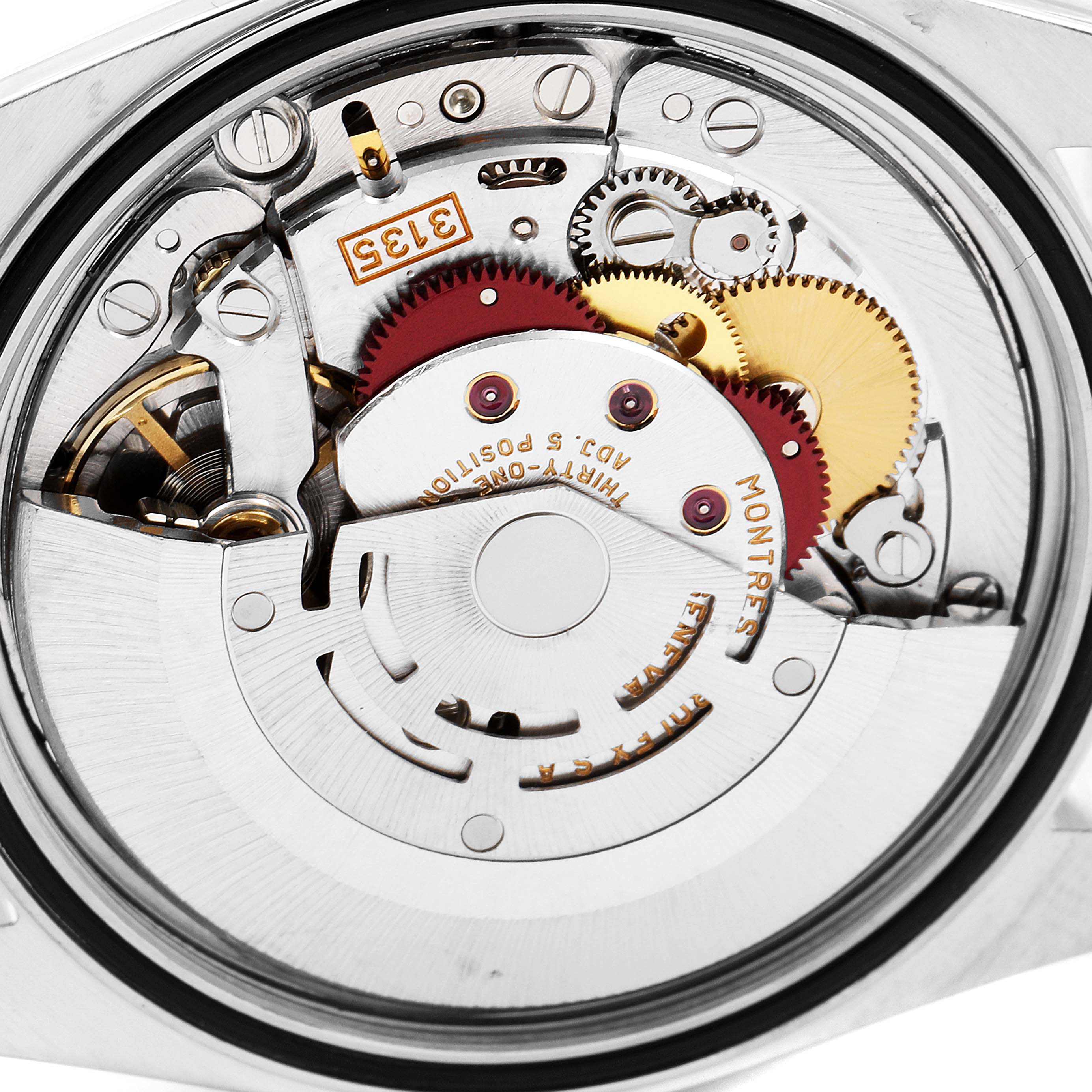 The image shows the movement mechanism of a Rolex Datejust 16233 Men's Steel and Gold (two tone) Blue Dial 16233 Men's Steel and Gold (two tone) Blue Dial watch, featuring gears and other internal components.