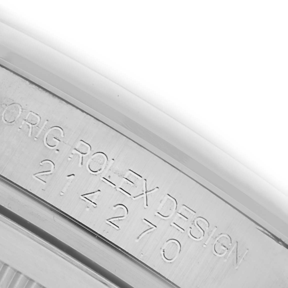 The image shows the side view of a Rolex Explorer 214270 Men's Stainless Steel Black Dial 214270 Men's Stainless Steel Black Dial watch case with engraved model information.