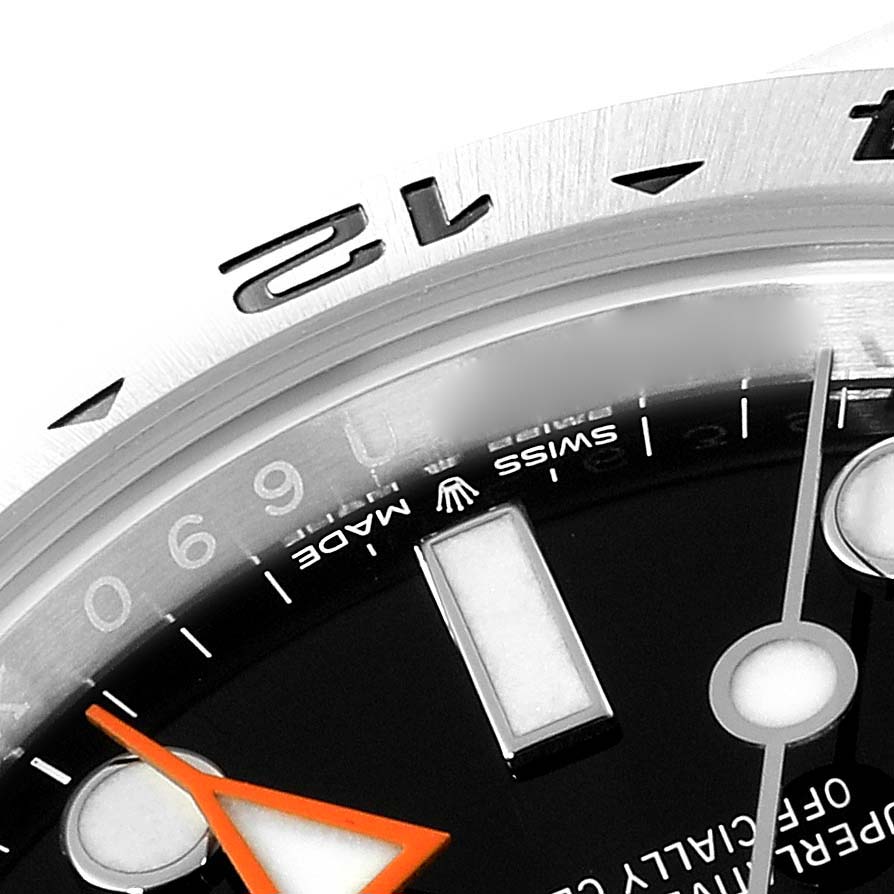 The image shows a close-up of the top right corner of the Rolex Explorer 226570 Men's Stainless Steel Black Dial 226570 Men's Stainless Steel Black Dial watch dial and bezel.
