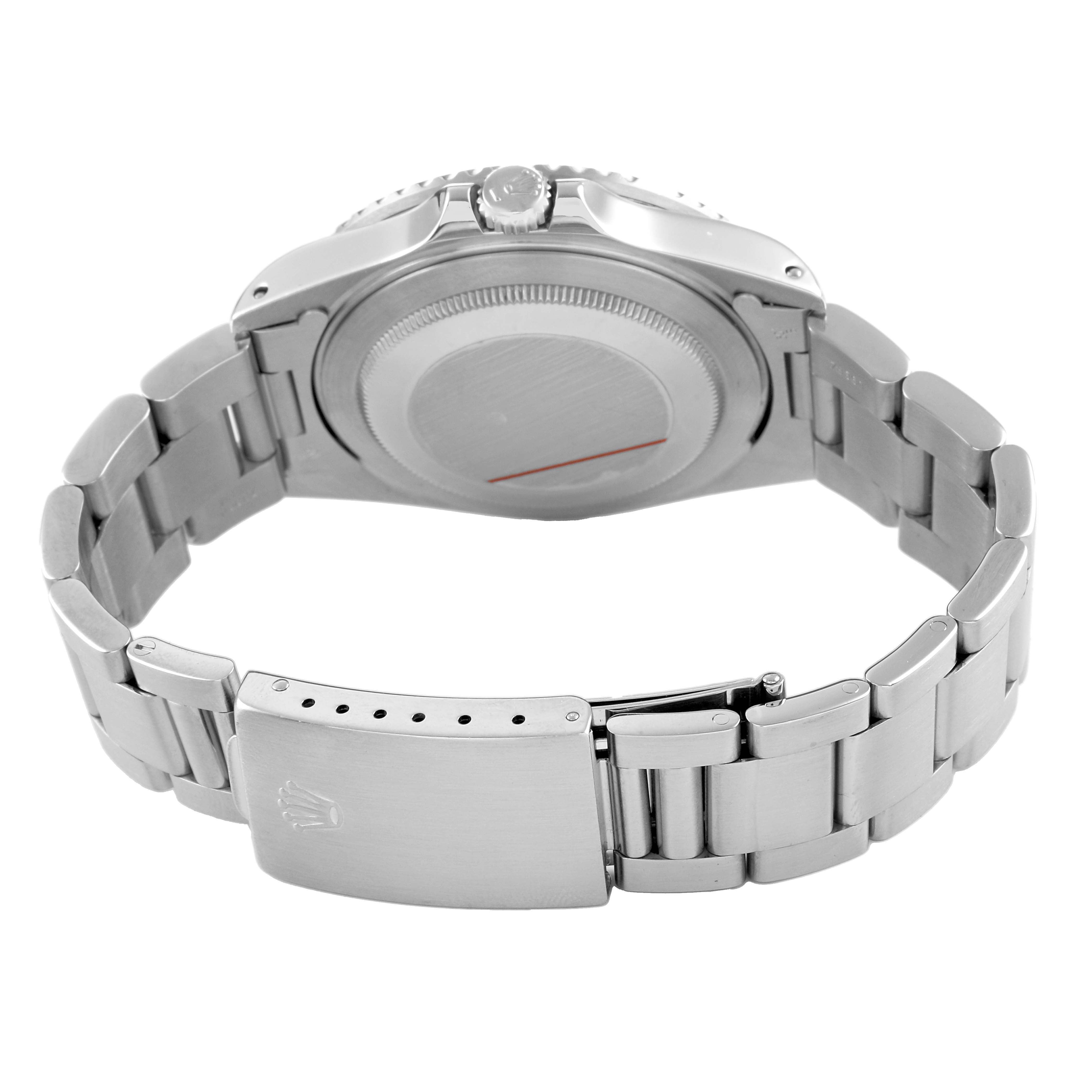 The image shows the back of a Rolex GMT-Master 16710 Men's Stainless Steel Black Dial, featuring the case back, crown, and metal bracelet with a clasp.