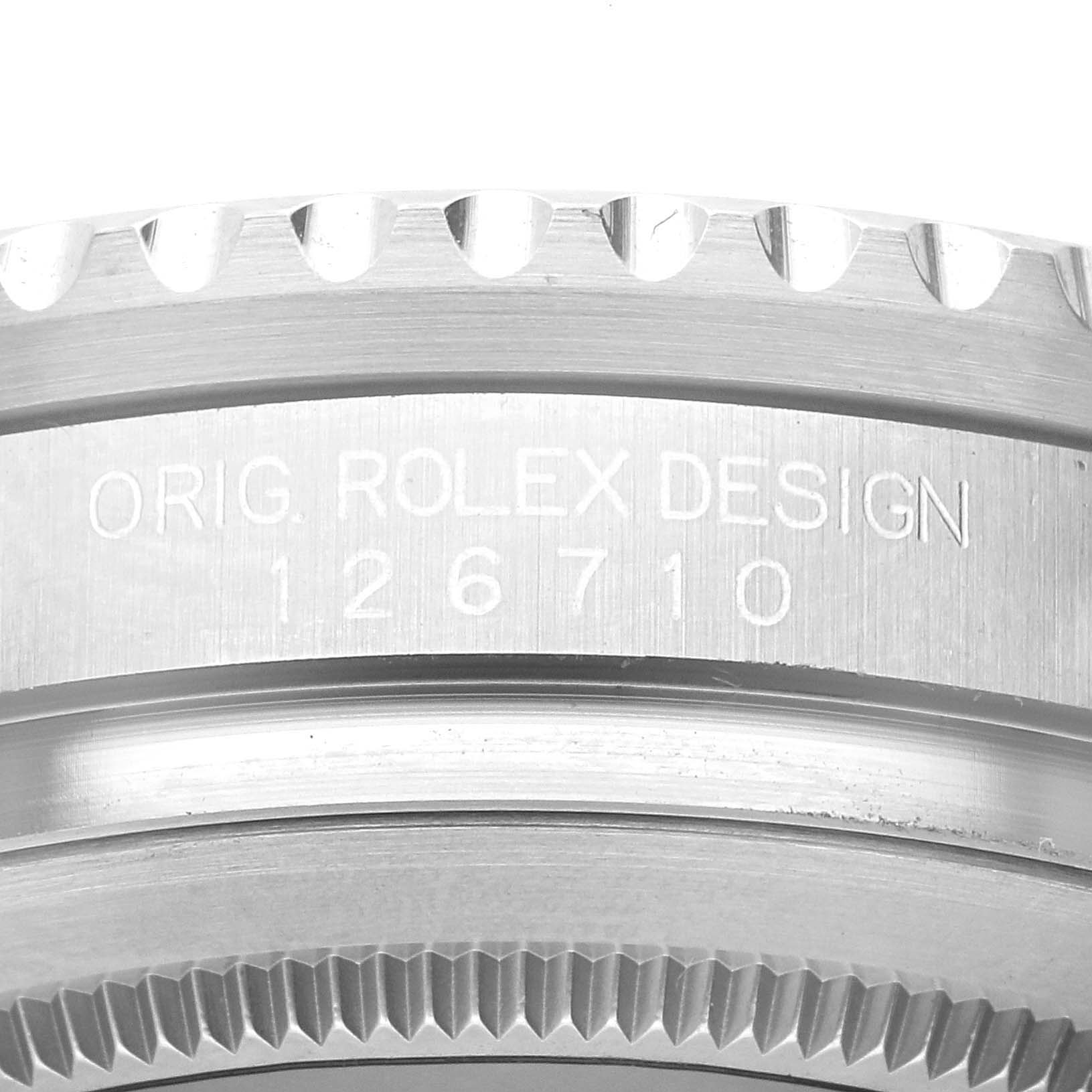 Close-up of the side of a Rolex GMT-Master 126710BLRO Men
s Stainless Steel Black Dial 126710BLRO Men
s Stainless Steel Black Dial showing the bezel, case, and engraved design number 126710.